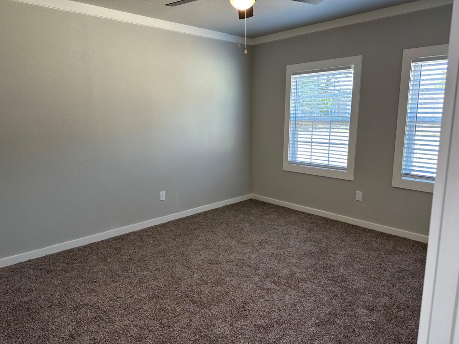 3408 29th Street Lubbock, TX 79410 - Photo 11 of 19 an empty room with a window