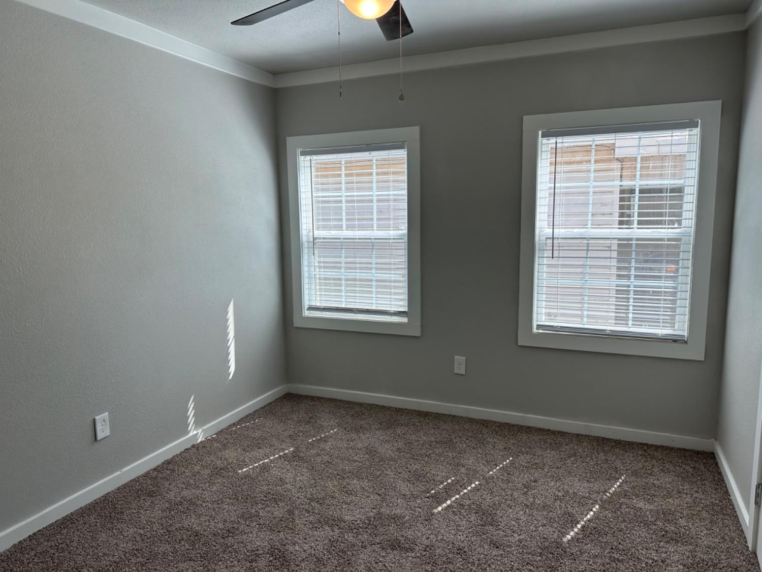 3408 29th Street Lubbock, TX 79410 - Photo 13 of 19 a view of an empty room with a window