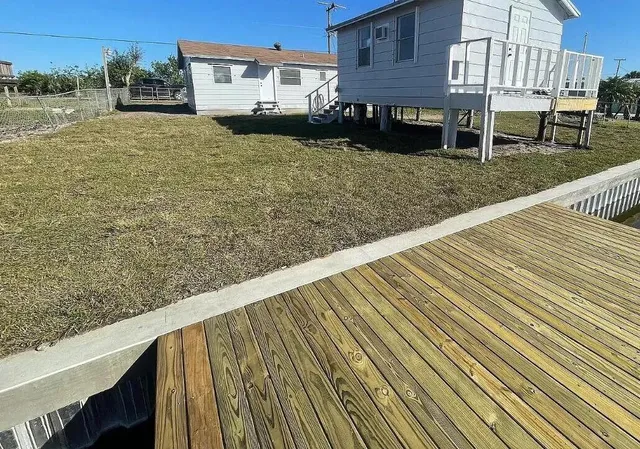 a view of a house with a roof deck