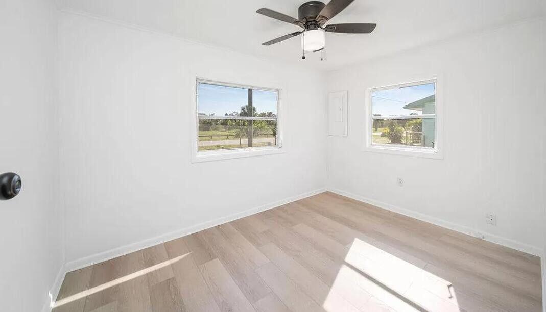 1520 Hunter Road, Unit A Okeechobee, FL 34974 - Photo 10 of 20 an empty room with a window