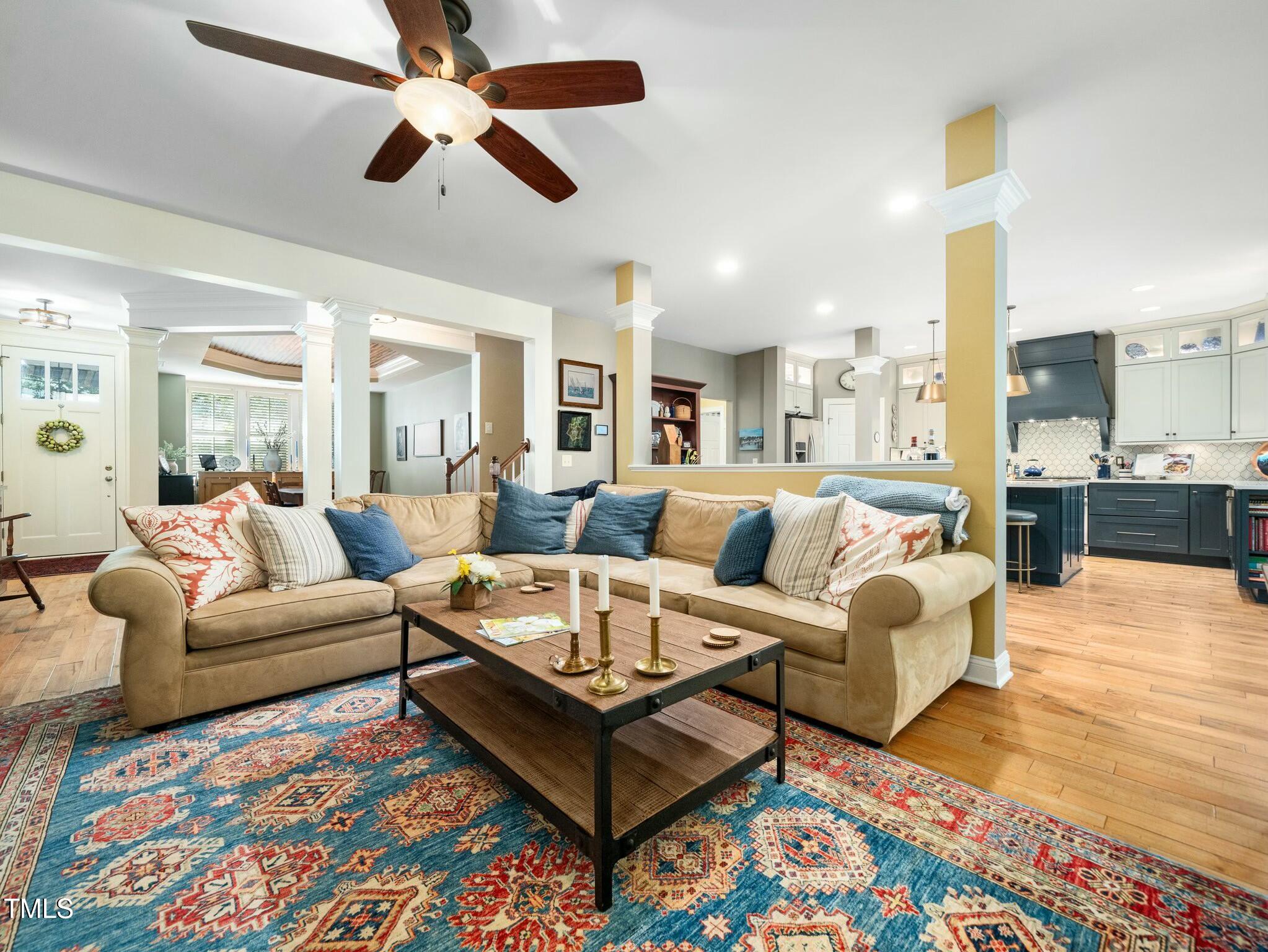 4210 Falls River Avenue Raleigh, NC 27614 - Photo 15 of 53 a living room with furniture and a large window