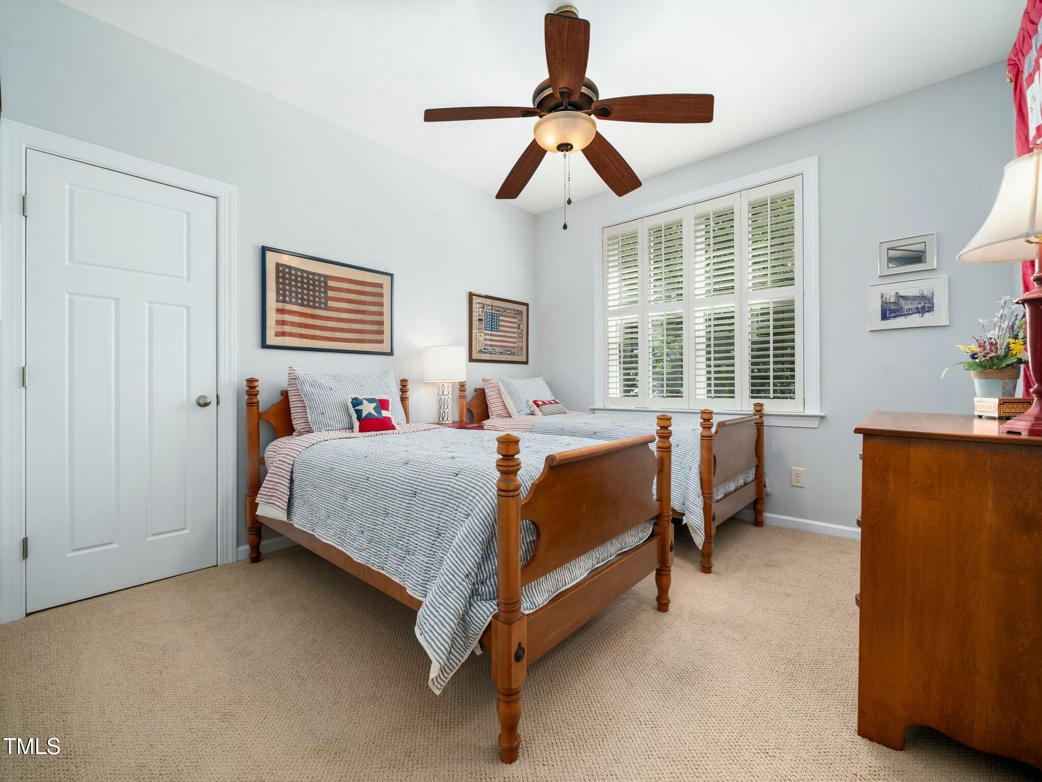 4210 Falls River Avenue Raleigh, NC 27614 - Photo 29 of 53 a bedroom with a bed and a window
