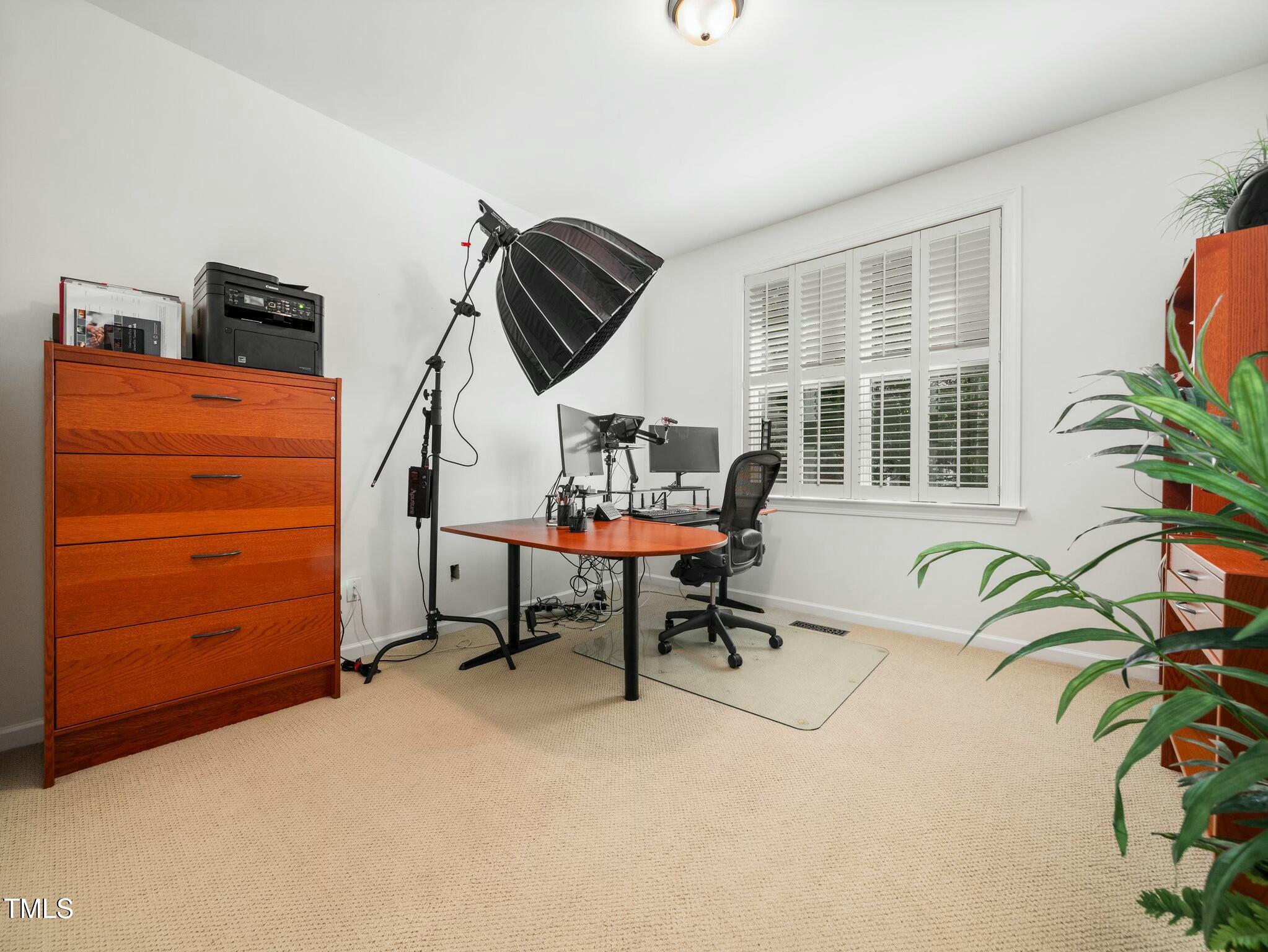4210 Falls River Avenue Raleigh, NC 27614 - Photo 30 of 53 a reading room with furniture and a window
