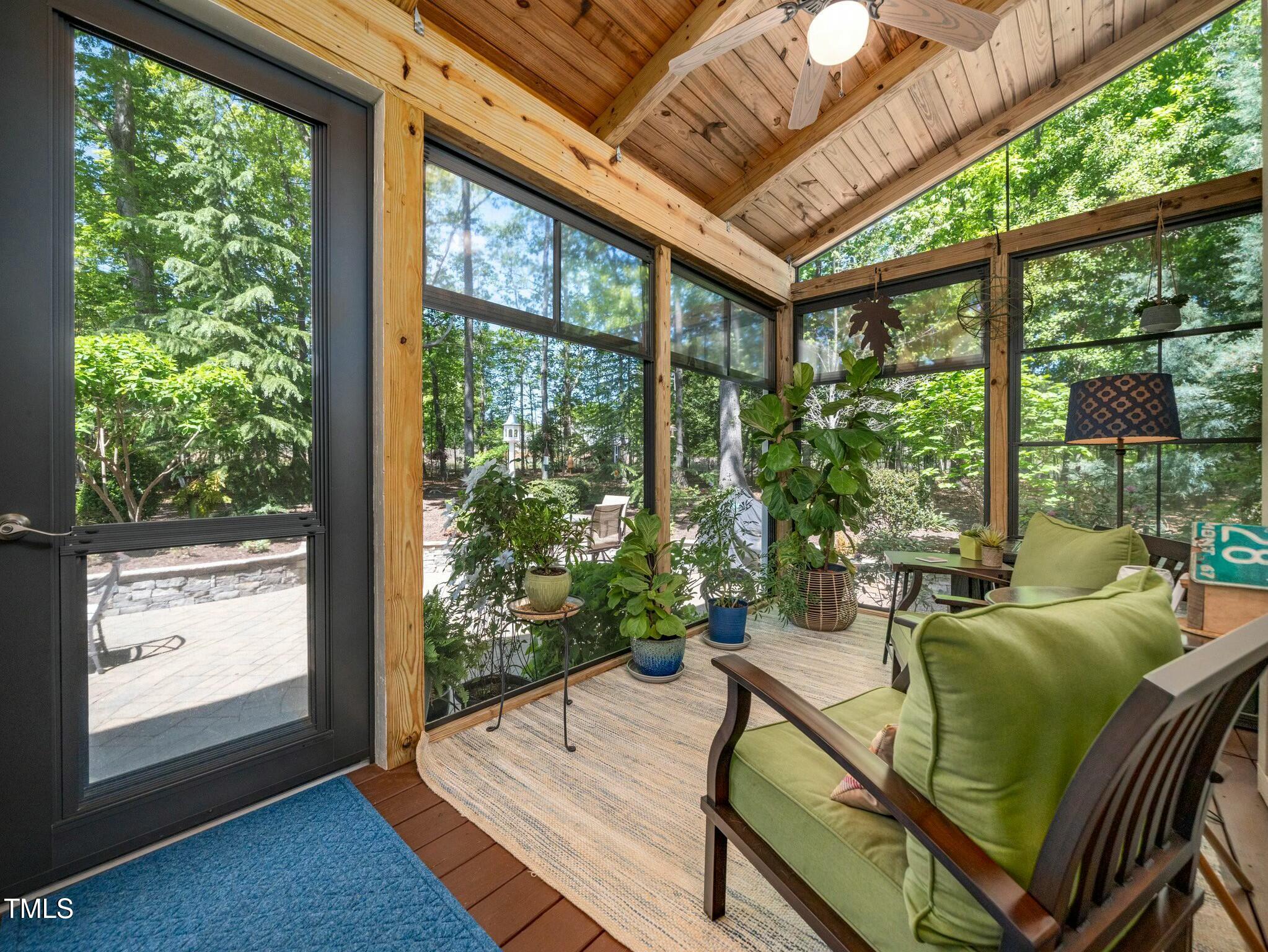 4210 Falls River Avenue Raleigh, NC 27614 - Photo 3 of 53 a living room with large windows