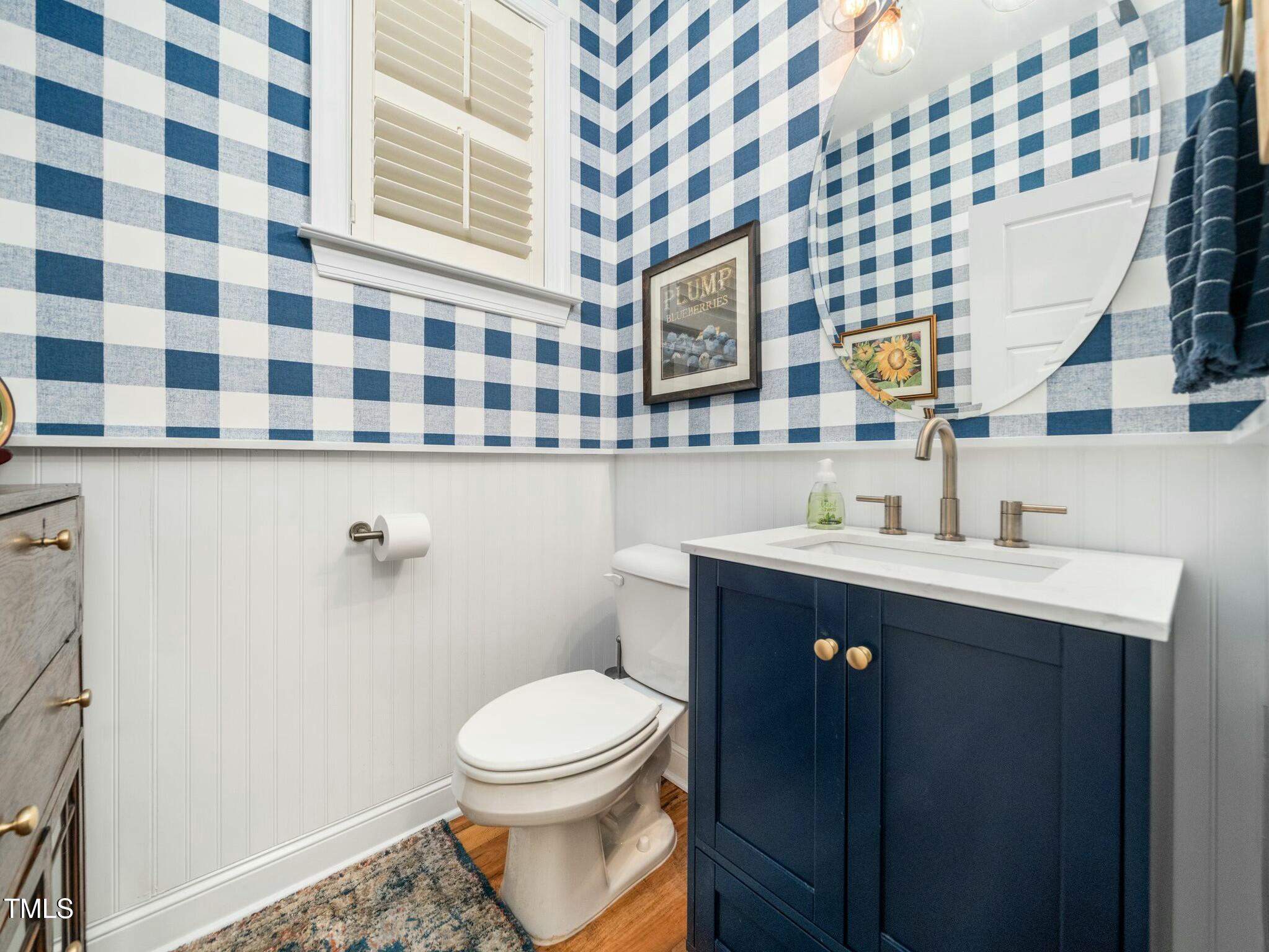 4210 Falls River Avenue Raleigh, NC 27614 - Photo 32 of 53 a bathroom with a sink and a toilet
