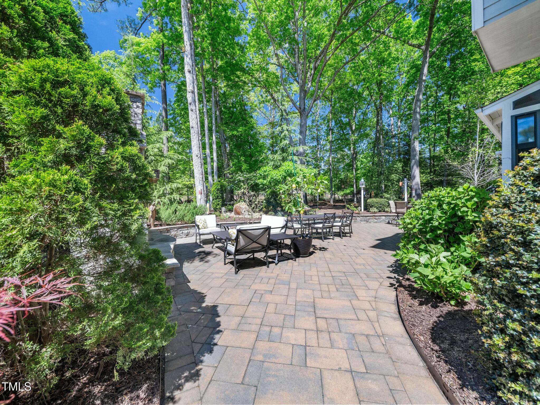 4210 Falls River Avenue Raleigh, NC 27614 - Photo 38 of 53 a view of garden with patio