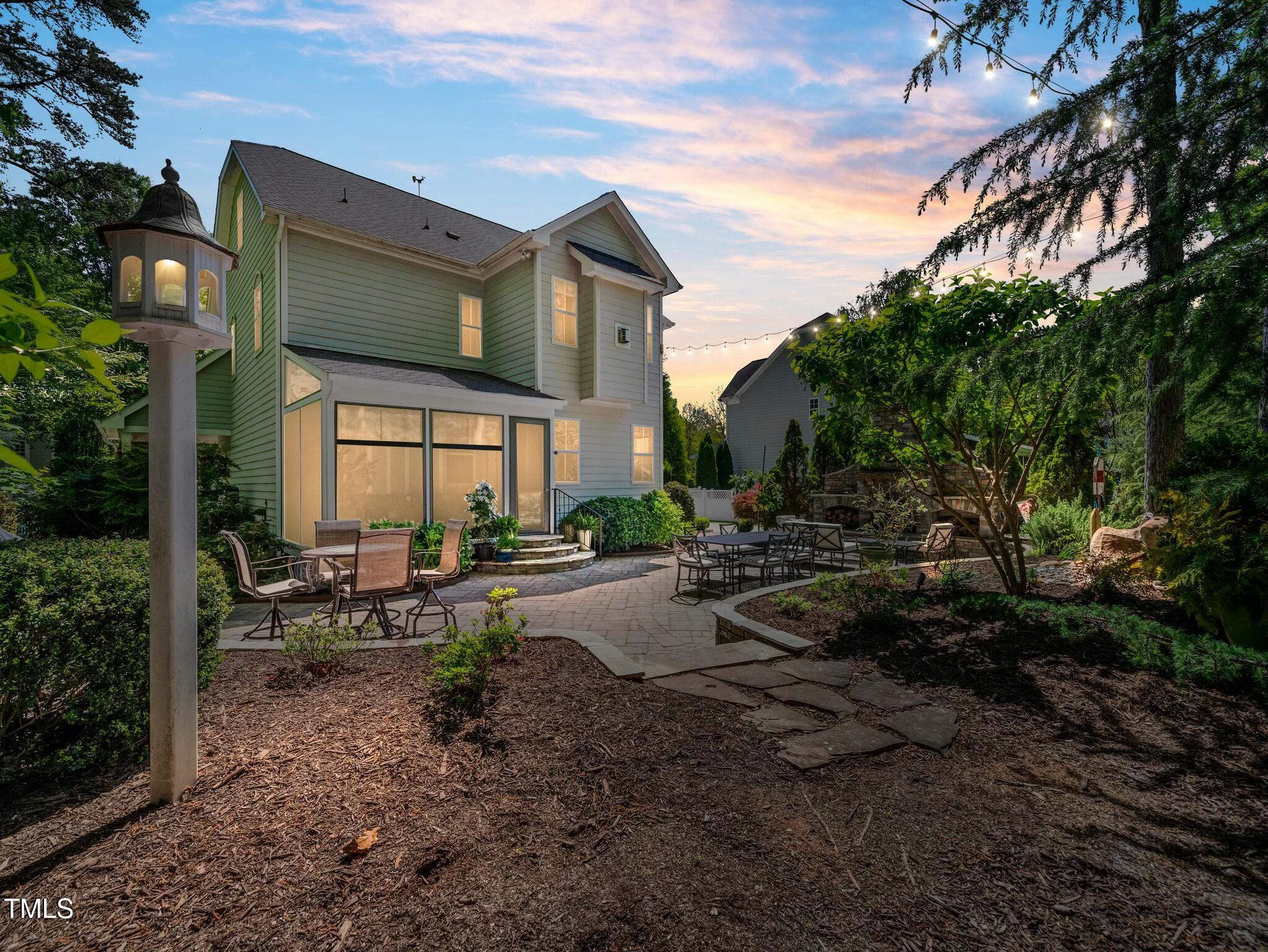 4210 Falls River Avenue Raleigh, NC 27614 - Photo 40 of 53 a view of a house with backyard and sitting area