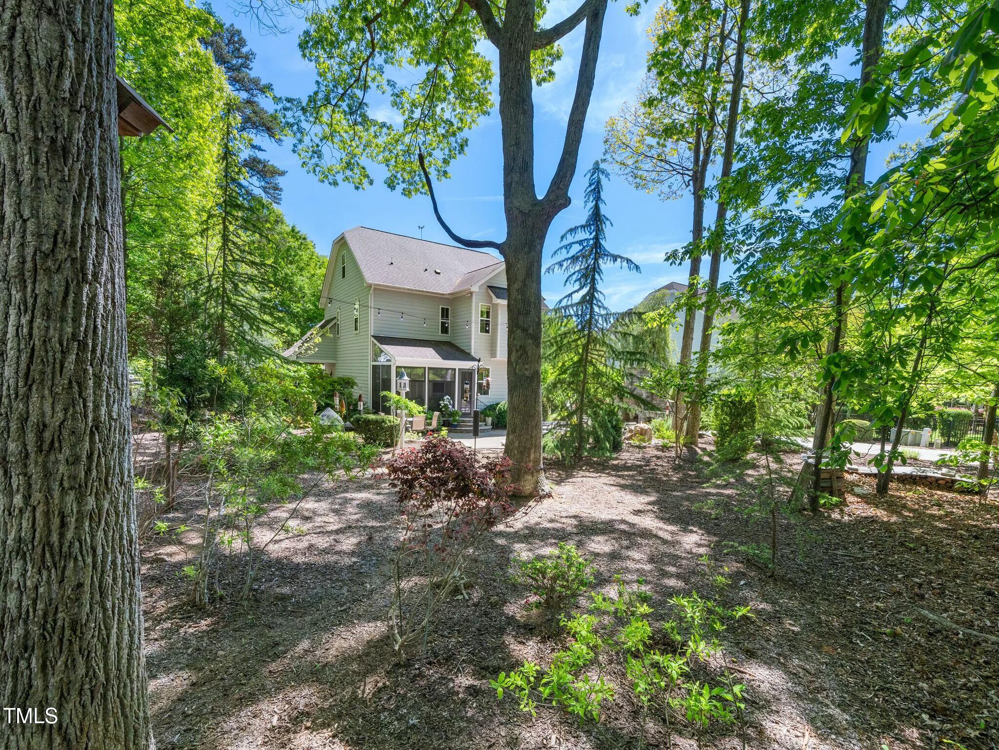4210 Falls River Avenue Raleigh, NC 27614 - Photo 41 of 53 a pathway of a house with a yard