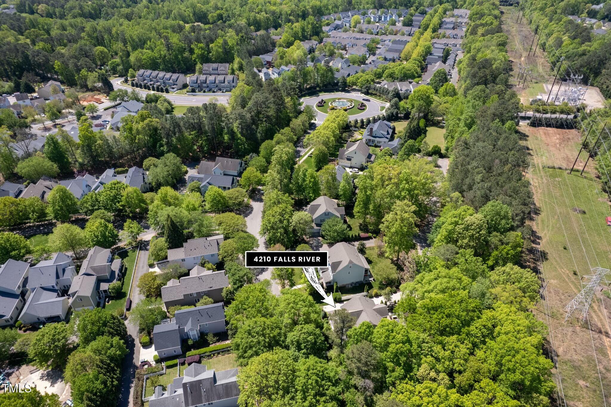 4210 Falls River Avenue Raleigh, NC 27614 - Photo 50 of 53 an aerial view of a house with a yard