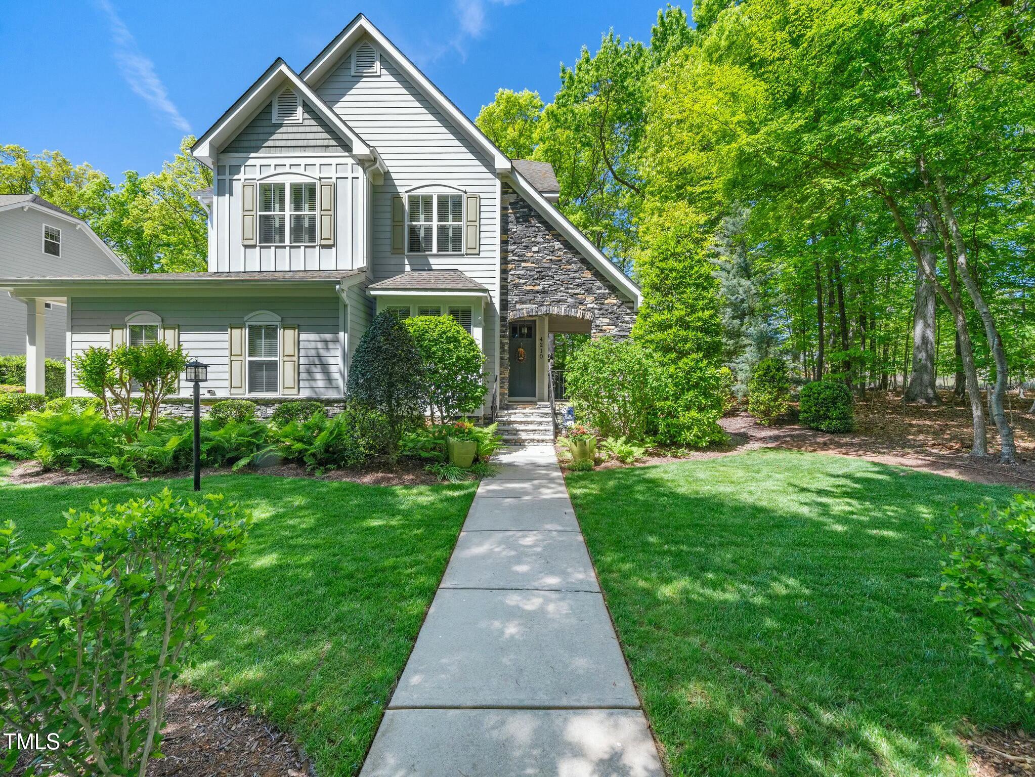 4210 Falls River Avenue Raleigh, NC 27614 - Photo 53 of 53 a front view of a house with yard
