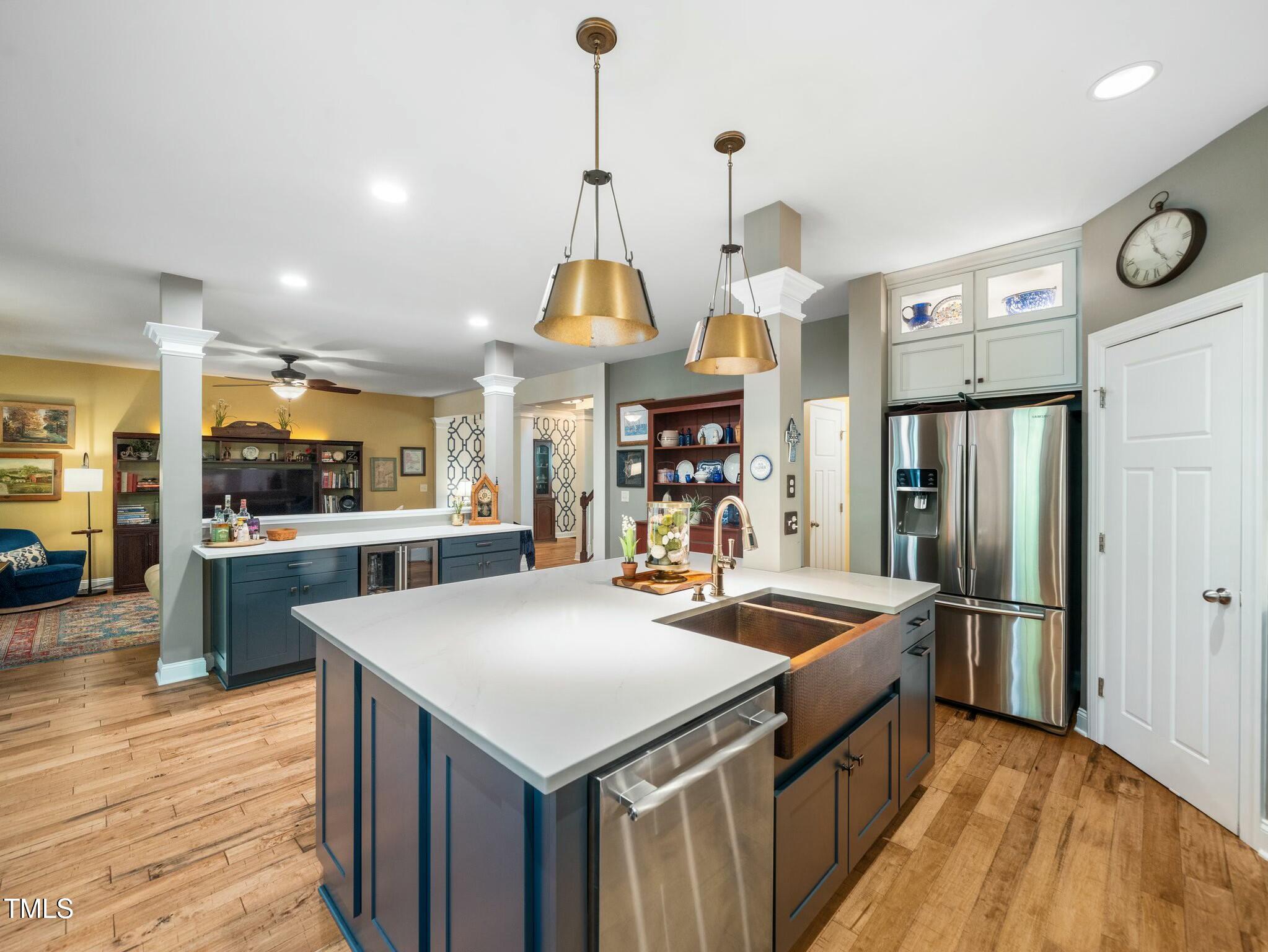 4210 Falls River Avenue Raleigh, NC 27614 - Photo 9 of 53 a kitchen with stainless steel appliances granite countertop a sink a oven and a refrigerator