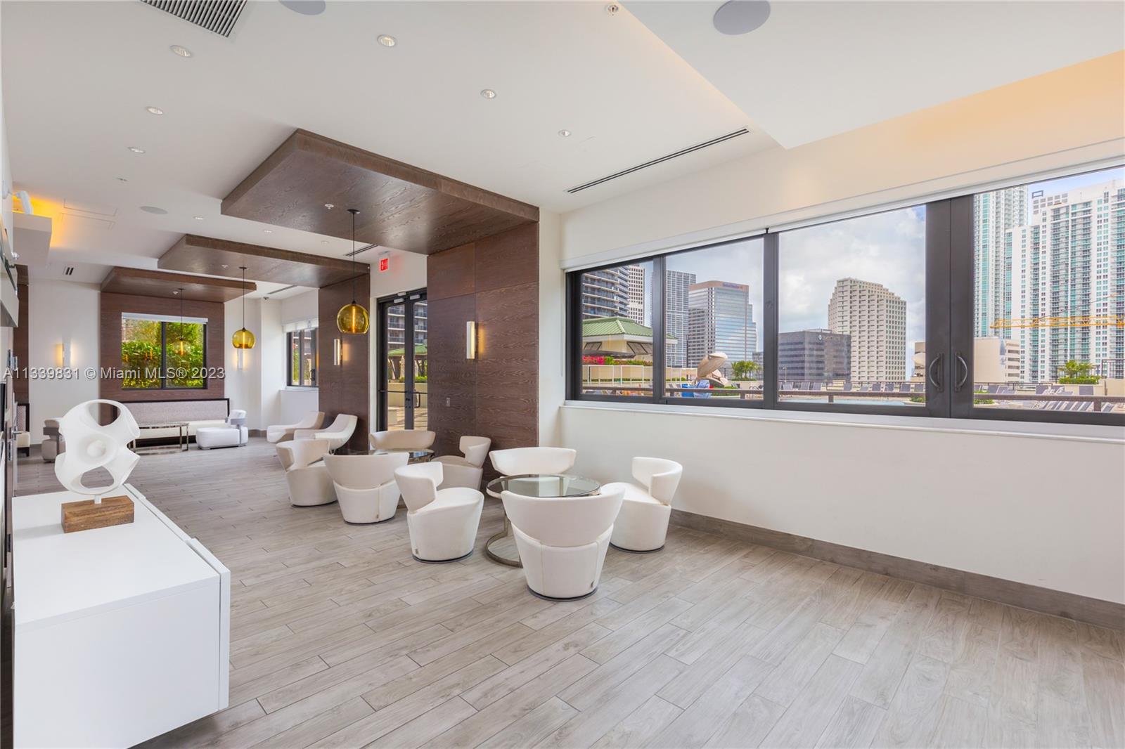 999 Southwest 1st Avenue, Unit 1811 Miami, FL 33130 - Photo 28 of 36 a living room with furniture and a large window