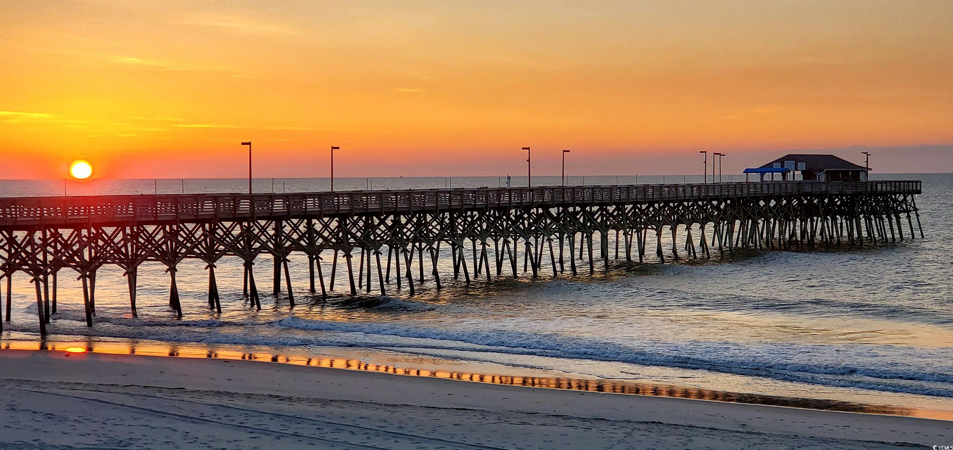 116 South Waccamaw Drive, Unit 207 Murrells Inlet, SC 29576 - Photo 3 of 26 Dock featuring view of water and beach and a pier