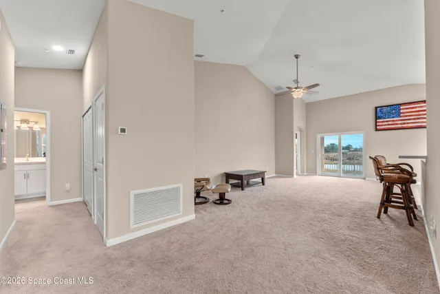 a view of livingroom with furniture and windows