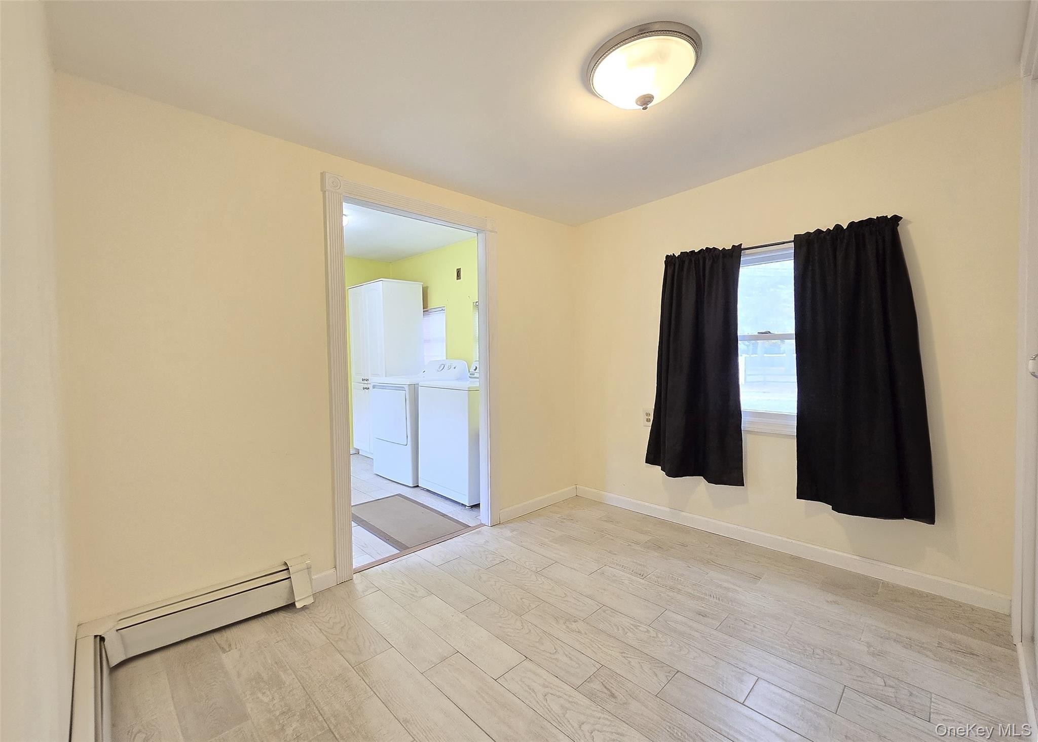 170 Forge Road Calverton, NY 11933 - Photo 16 of 23 wooden floor in an empty room