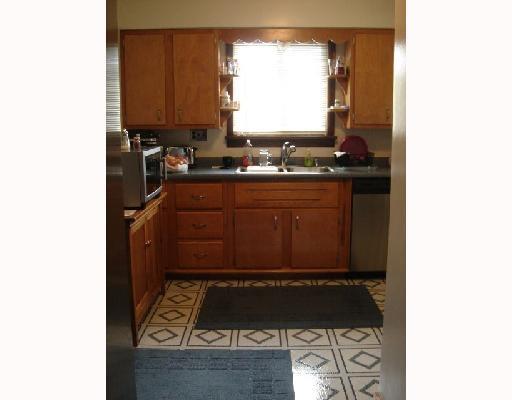 204 Rovel Street Apollo, PA 15613 - Photo 3 of 8 Kitchen. Updated kitchen with Newer Counter tops, double bowl sink, vinyl flooring and paint.