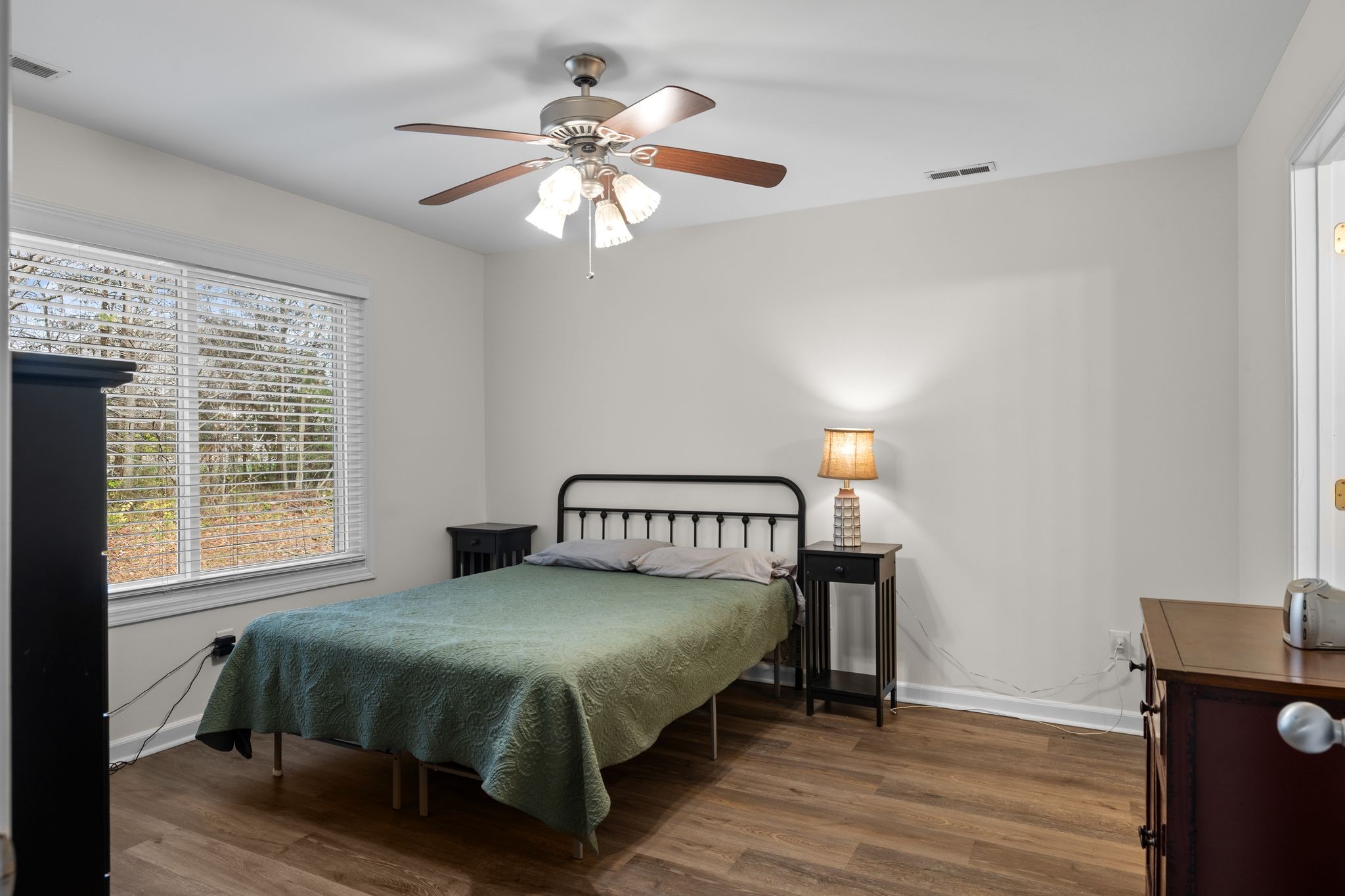 2041 Golden Court Spring Hill, TN 37174 - Photo 14 of 20 a bedroom with a bed and wooden floor