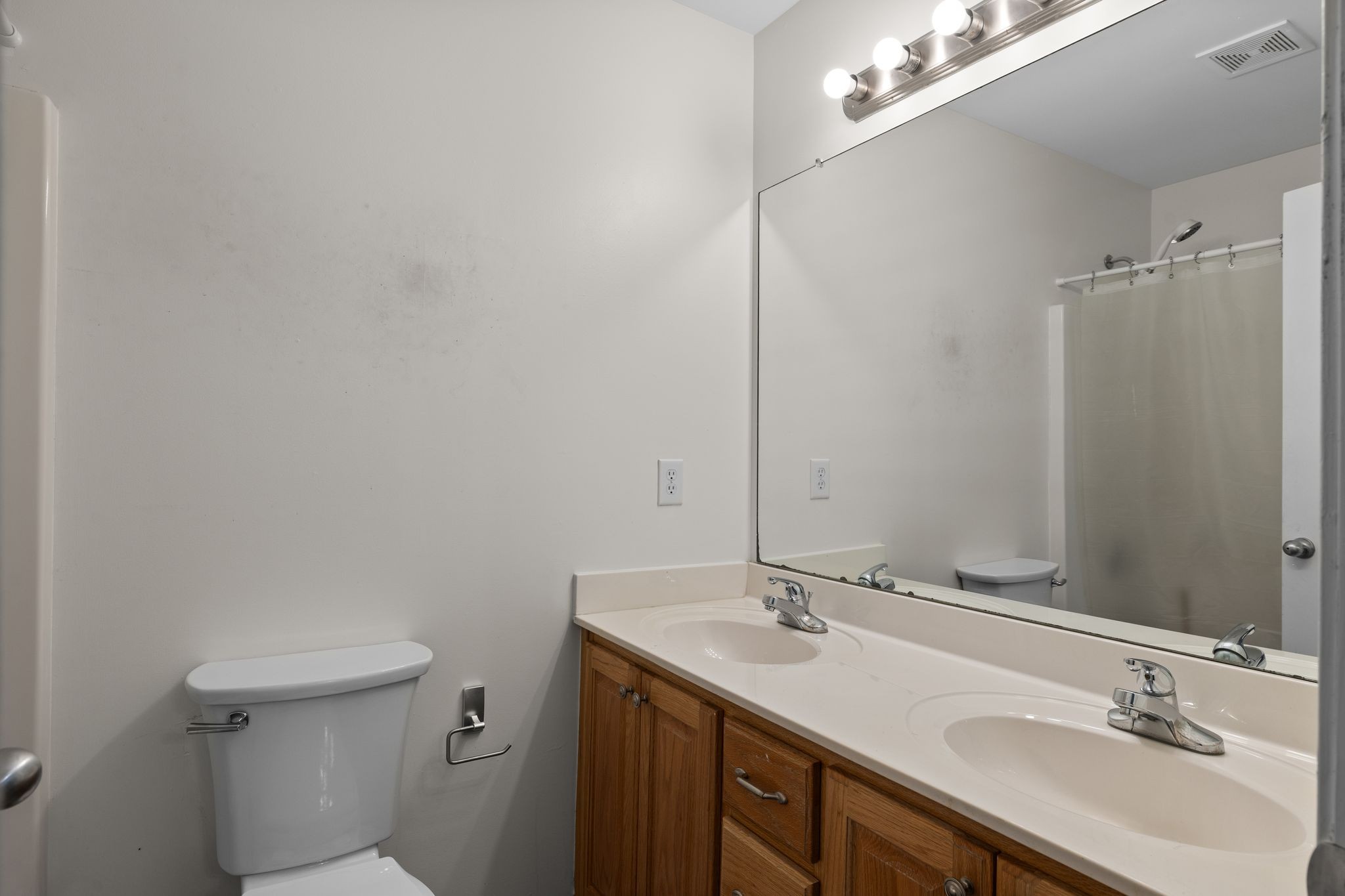2041 Golden Court Spring Hill, TN 37174 - Photo 15 of 20 a bathroom with a sink toilet and shower