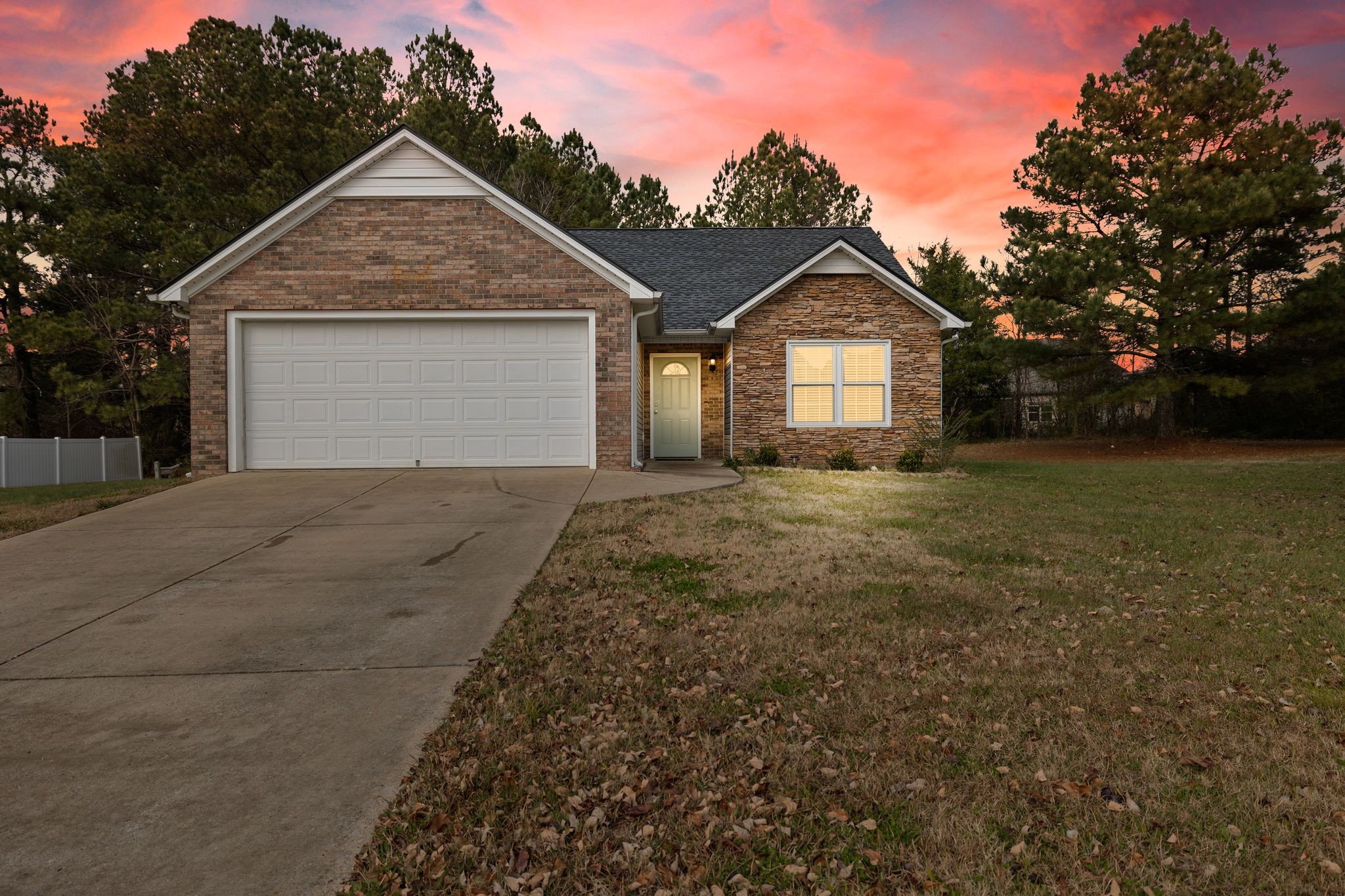 2041 Golden Court Spring Hill, TN 37174 - Photo 20 of 20 a front view of a house with a yard and garage