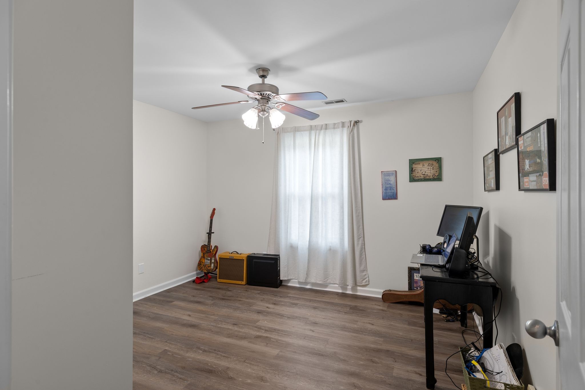 2041 Golden Court Spring Hill, TN 37174 - Photo 5 of 20 a view of a workspace with furniture and a window