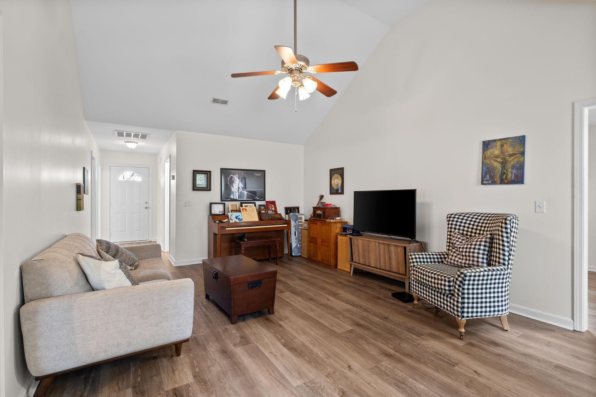 2041 Golden Court Spring Hill, TN 37174 - Photo 8 of 20 a living room with furniture and a flat screen tv