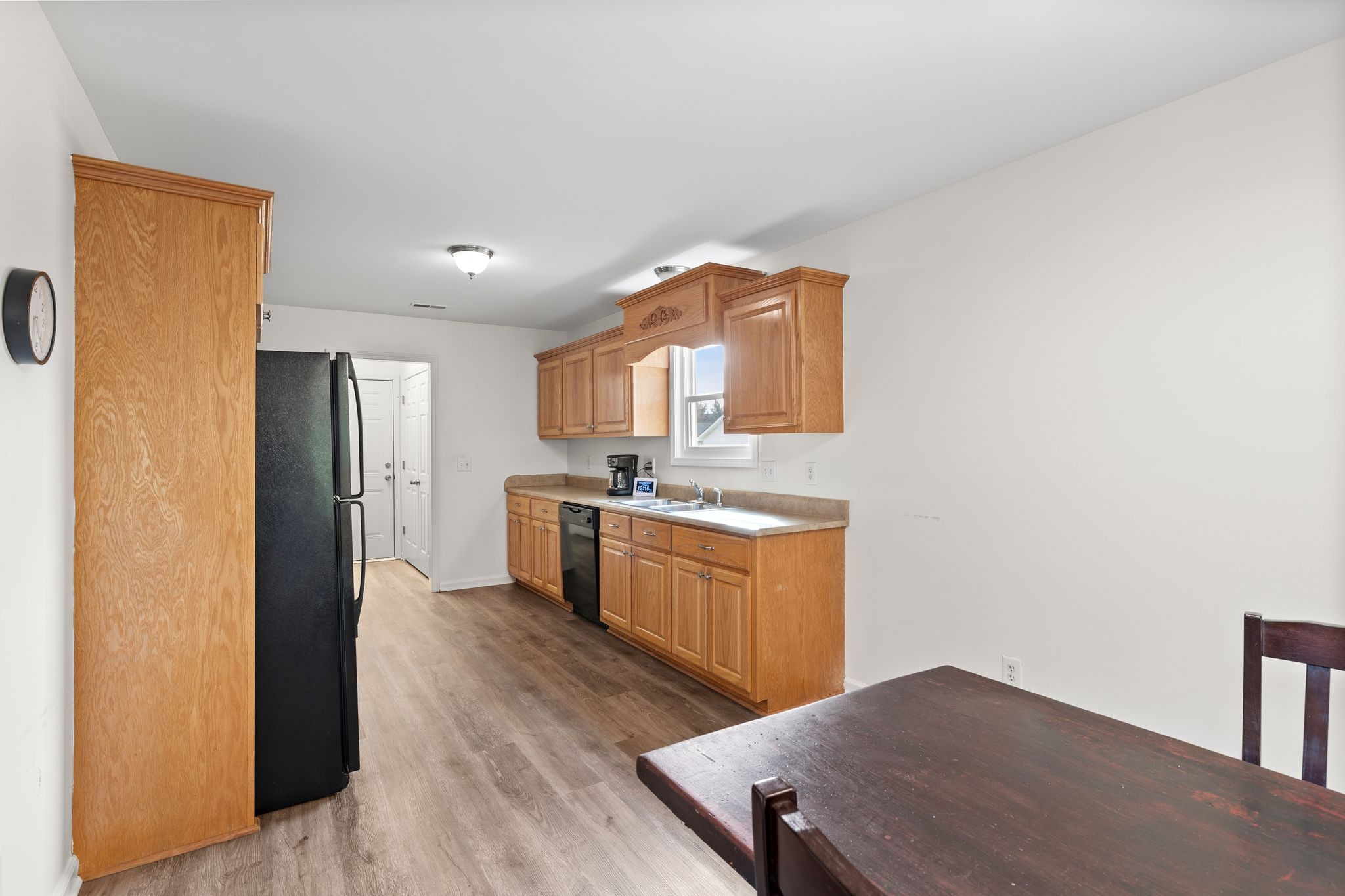2041 Golden Court Spring Hill, TN 37174 - Photo 9 of 20 a kitchen with a refrigerator and a sink