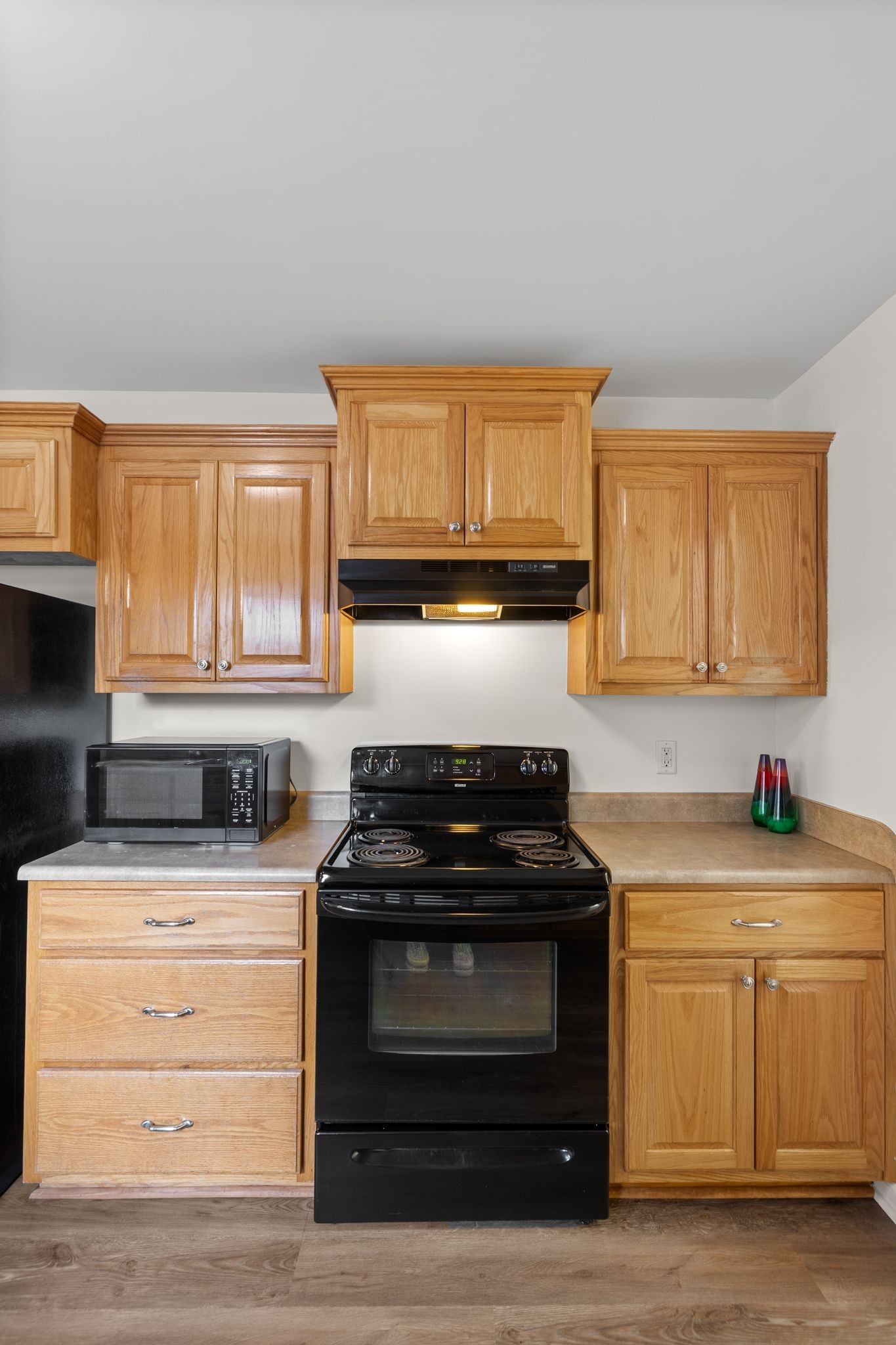 2041 Golden Court Spring Hill, TN 37174 - Photo 10 of 20 a kitchen with granite countertop a stove and a sink