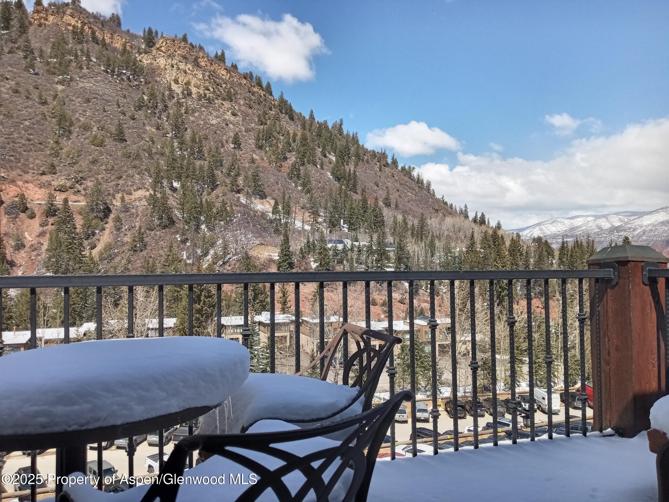 39 Boomerang Road, Unit 8411 21 Aspen, CO 81611 - Photo 23 of 25 a view of balcony with furniture