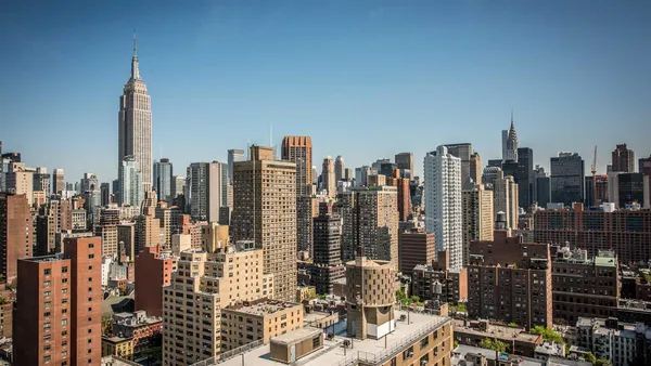 a view of city and tall buildings