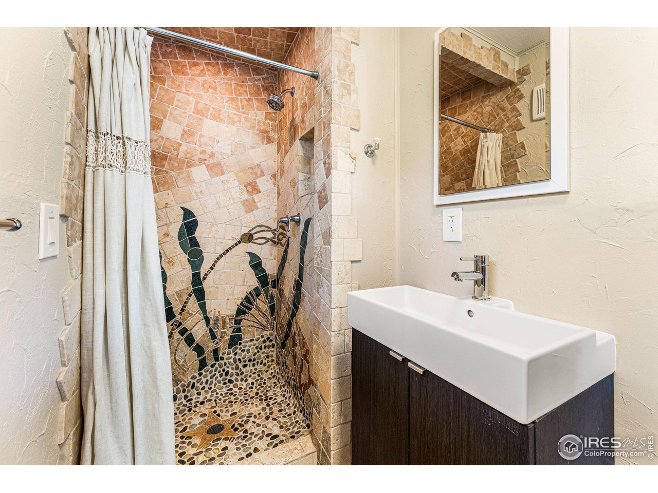 3396 Plateau Road Longmont, CO 80503 - Photo 13 of 40 Artistic mosaic shower in primary bath