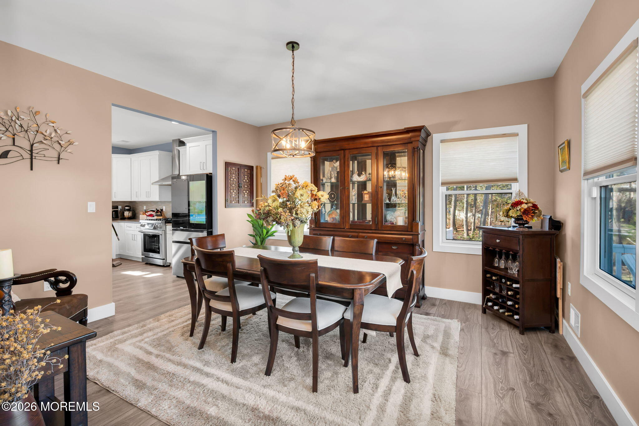312 Elm Court Brick, NJ 08723 - Photo 11 of 57 a view of a dining room with furniture window and wooden floor