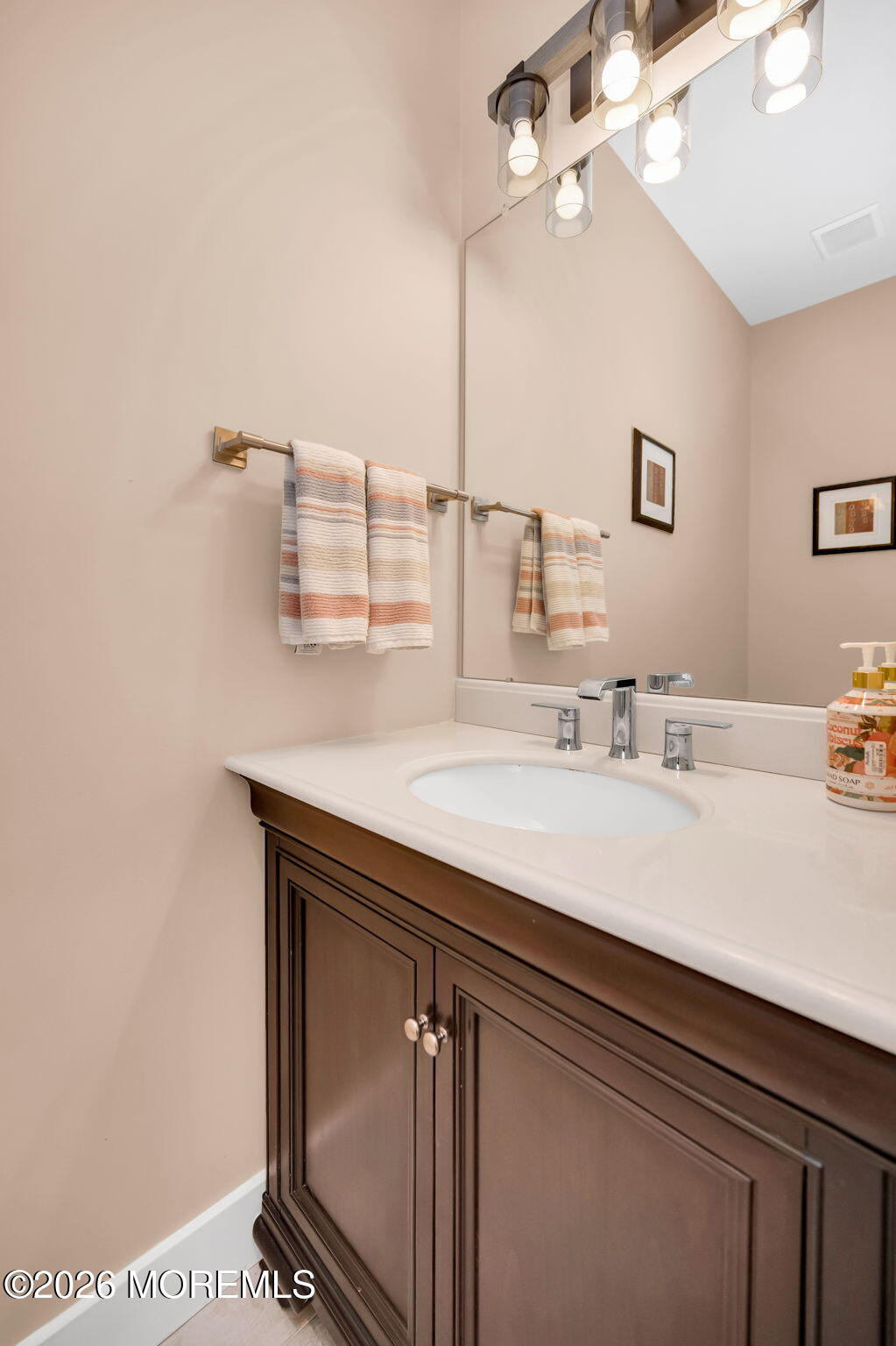312 Elm Court Brick, NJ 08723 - Photo 13 of 57 a bathroom with a sink vanity and granite