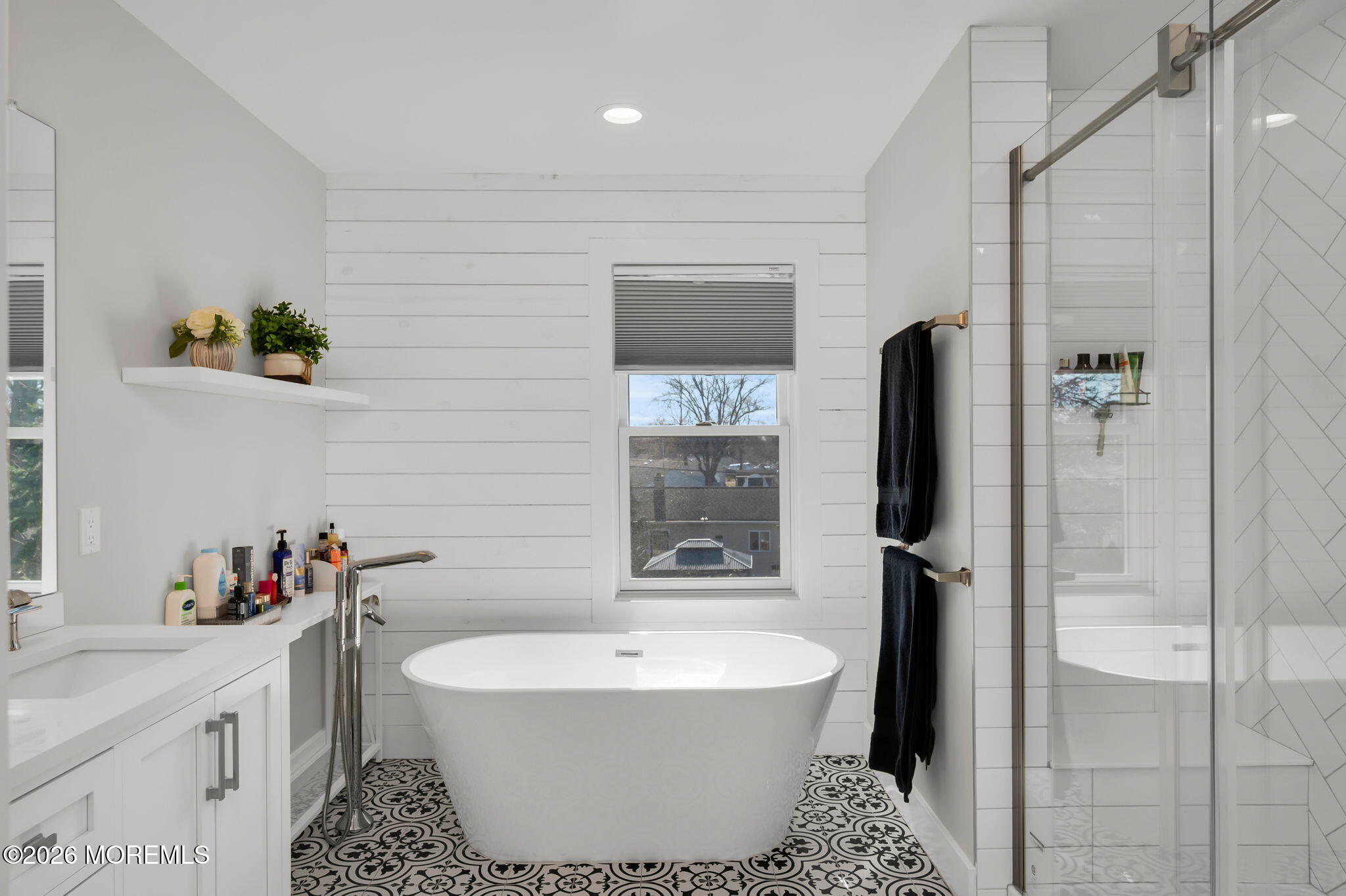 312 Elm Court Brick, NJ 08723 - Photo 36 of 57 a bathroom with a bathtub and shower