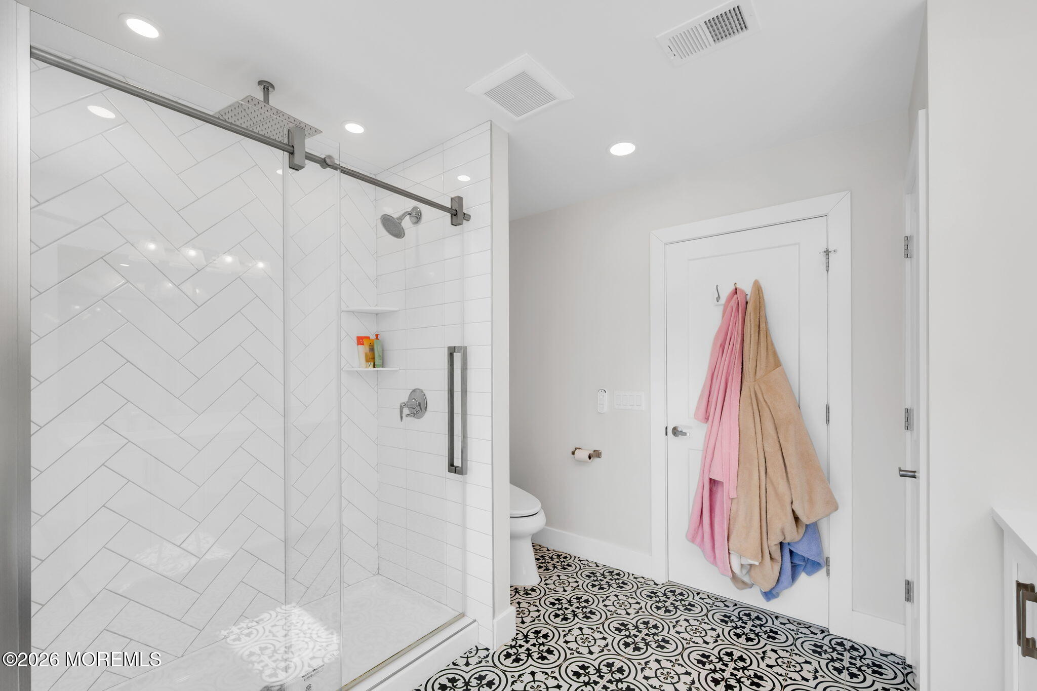 312 Elm Court Brick, NJ 08723 - Photo 39 of 57 a bathroom with a shower and a toilet