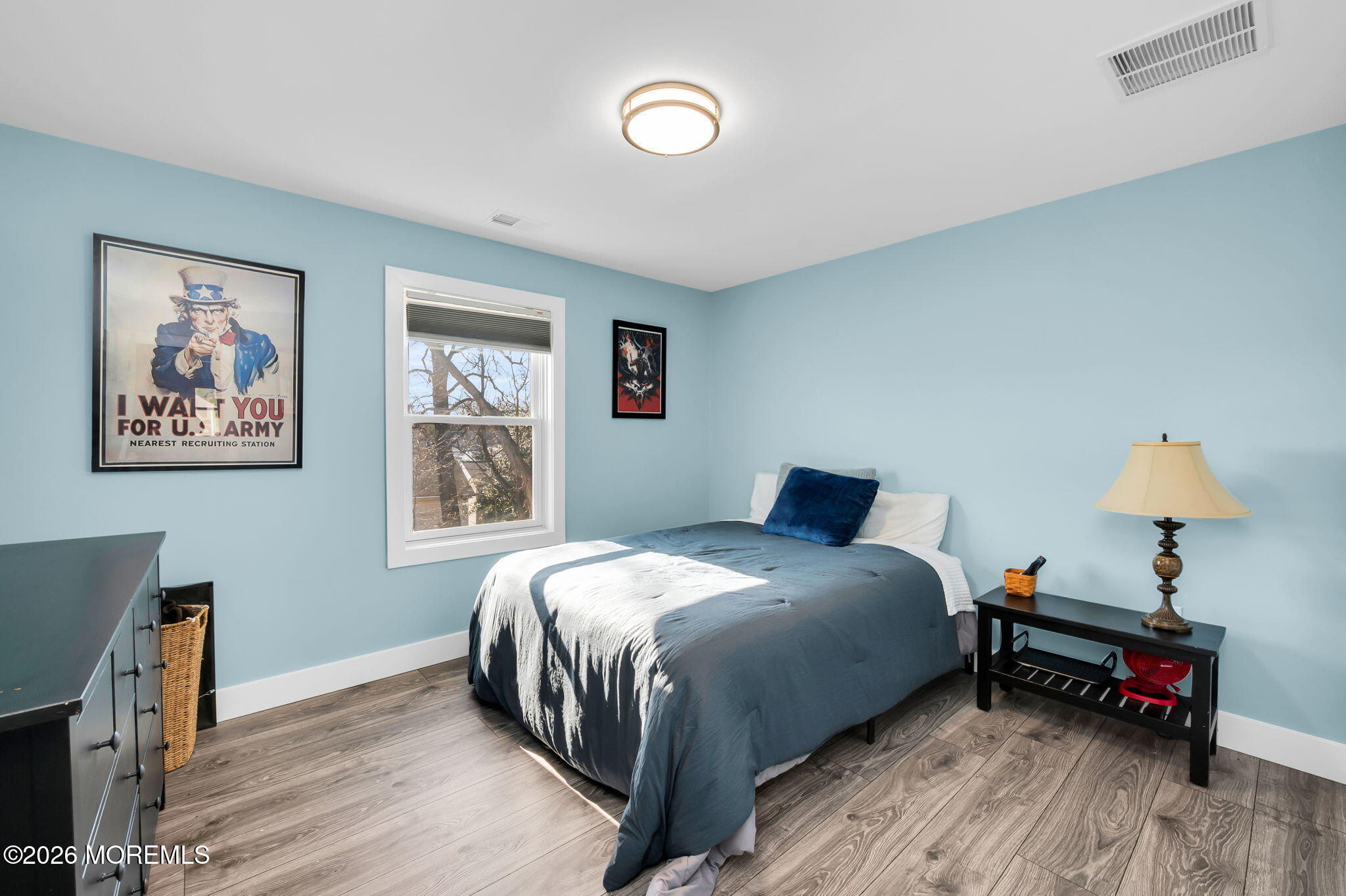 312 Elm Court Brick, NJ 08723 - Photo 43 of 57 a bedroom with a bed wooden floor and a window