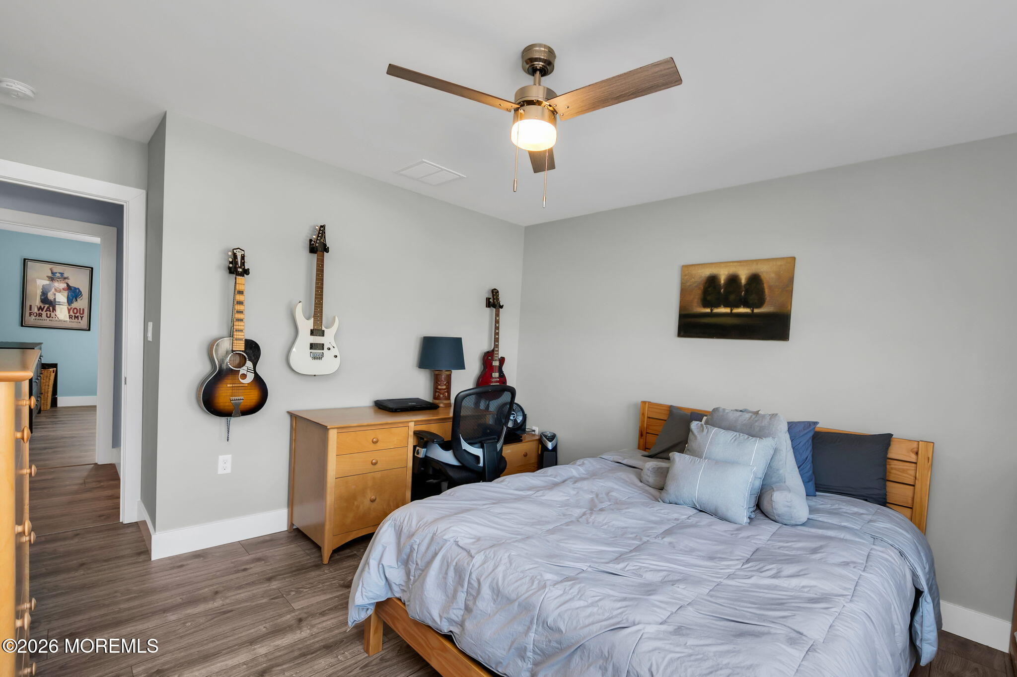 312 Elm Court Brick, NJ 08723 - Photo 45 of 57 a bedroom with bed and wooden floor