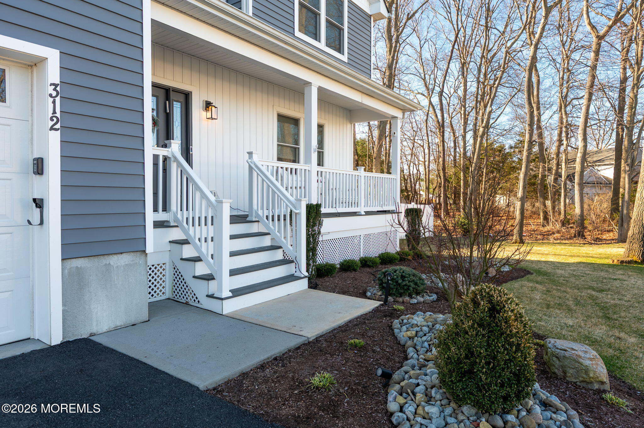 312 Elm Court Brick, NJ 08723 - Photo 5 of 57 a view of a house with a yard