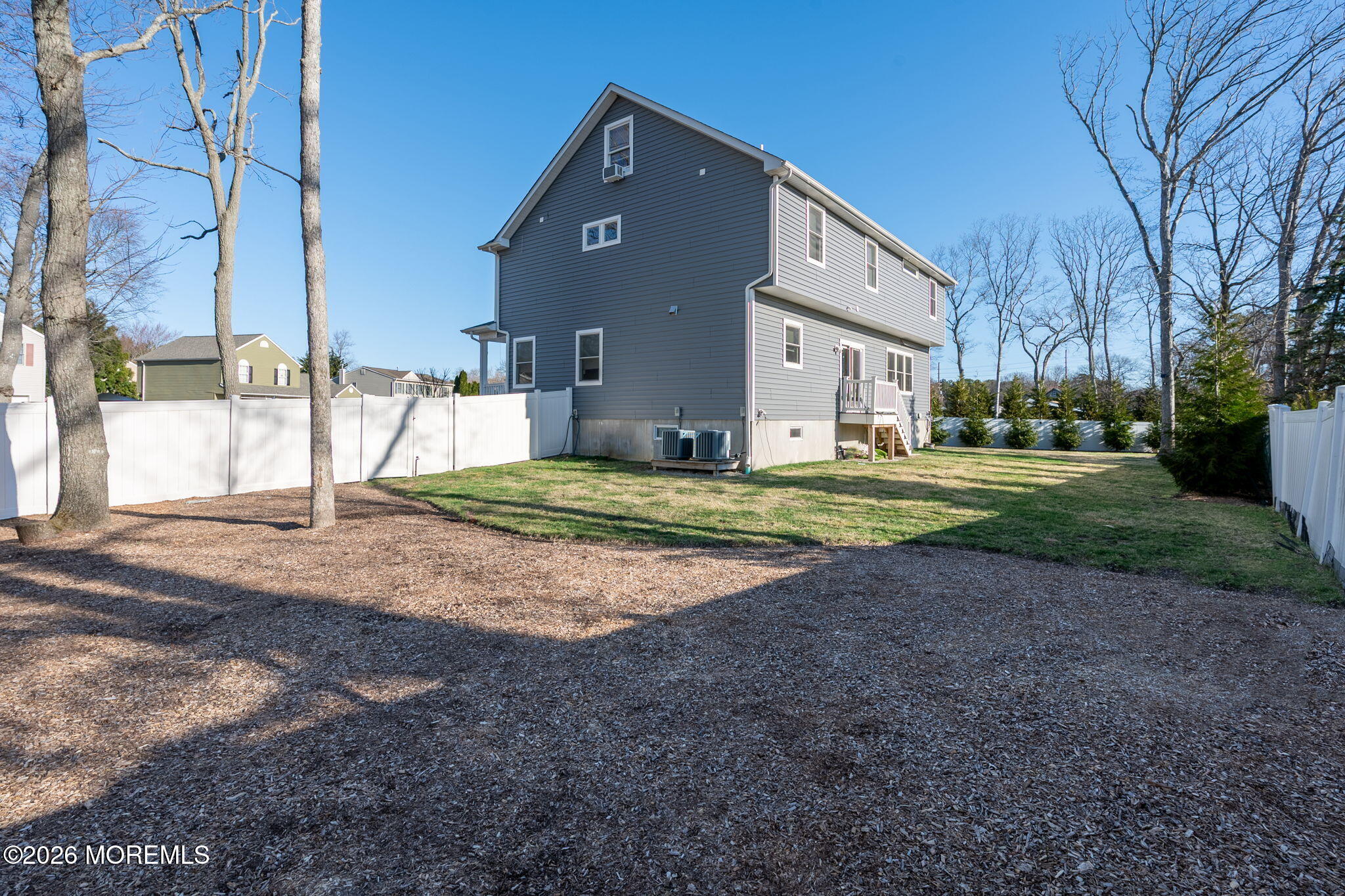 312 Elm Court Brick, NJ 08723 - Photo 56 of 57 a house view with a sitting space