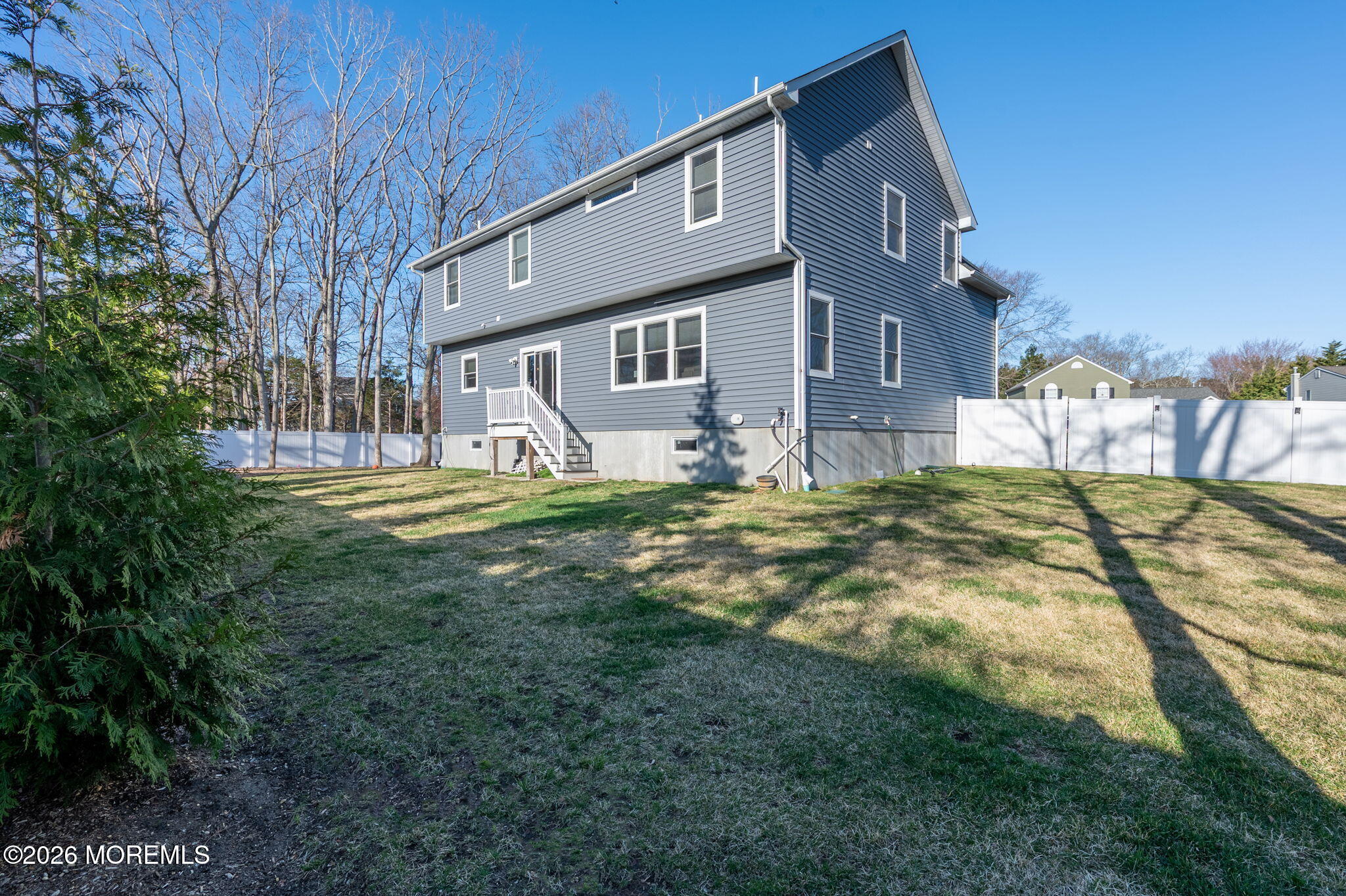 312 Elm Court Brick, NJ 08723 - Photo 57 of 57 a view of a house with a big yard