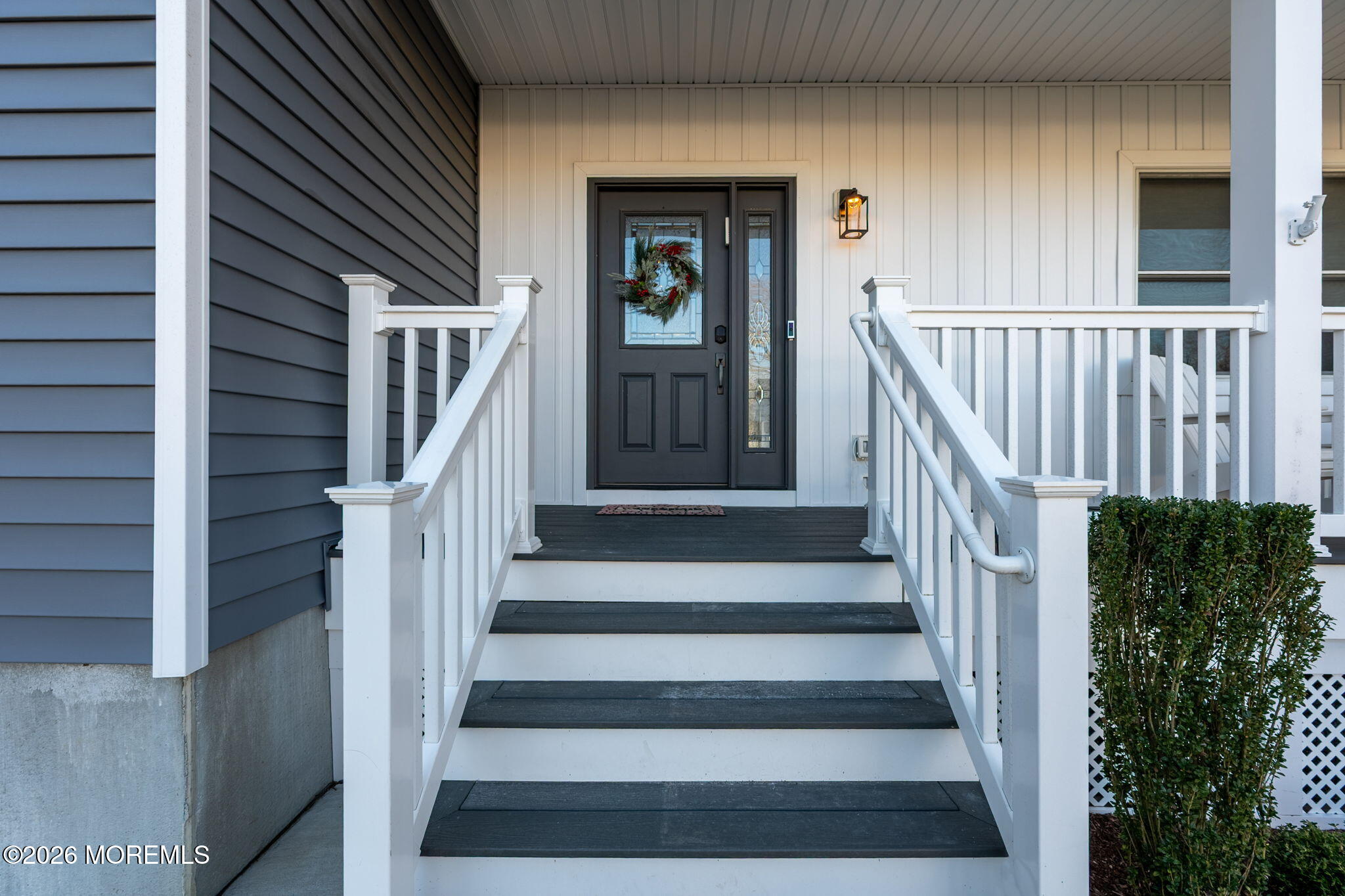 312 Elm Court Brick, NJ 08723 - Photo 6 of 57 a view of entryway and hall with wooden floor