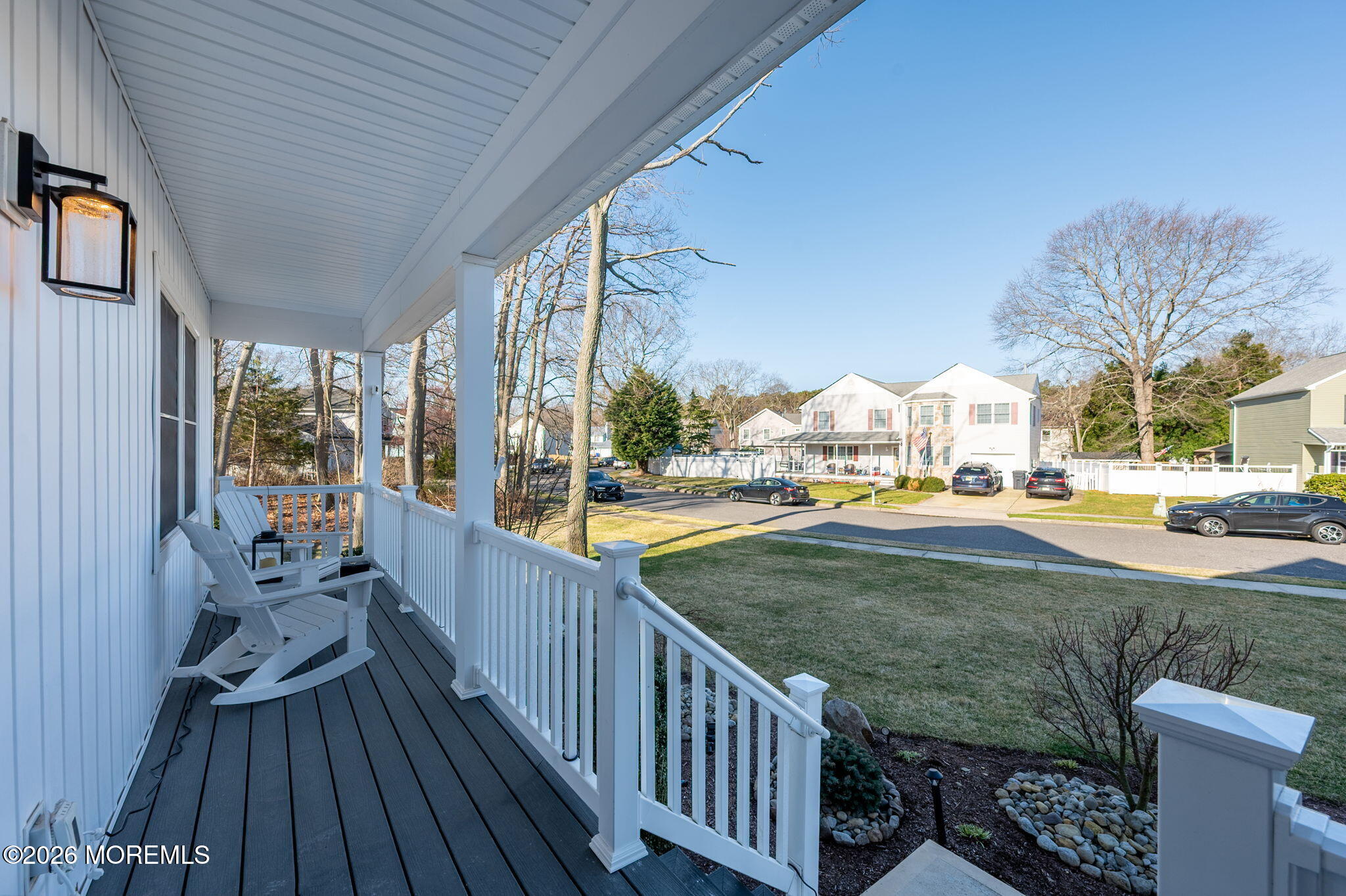 312 Elm Court Brick, NJ 08723 - Photo 7 of 57 a view of balcony with wooden floor and outdoor seating