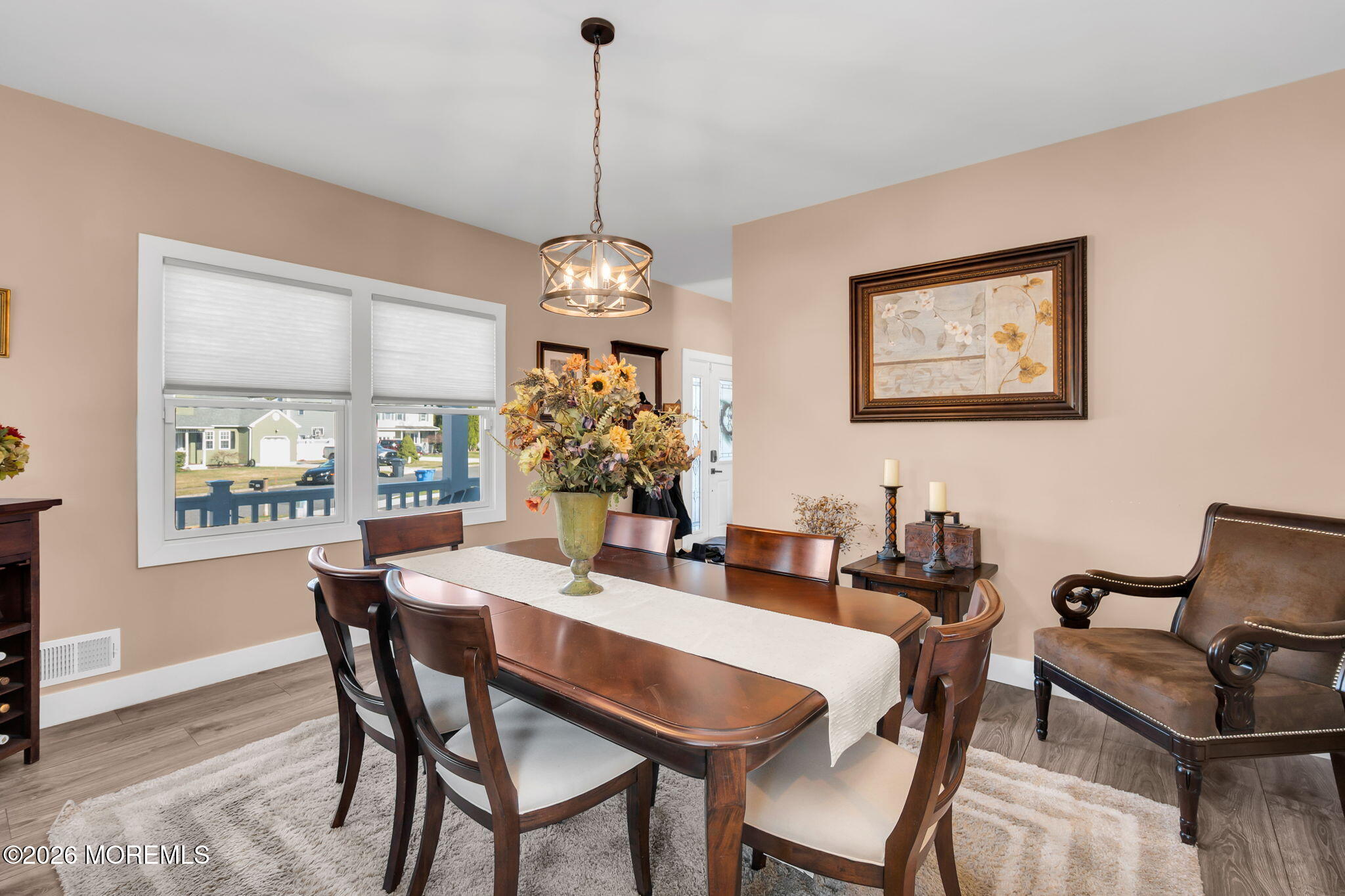 312 Elm Court Brick, NJ 08723 - Photo 10 of 57 a dining room with furniture a chandelier and window