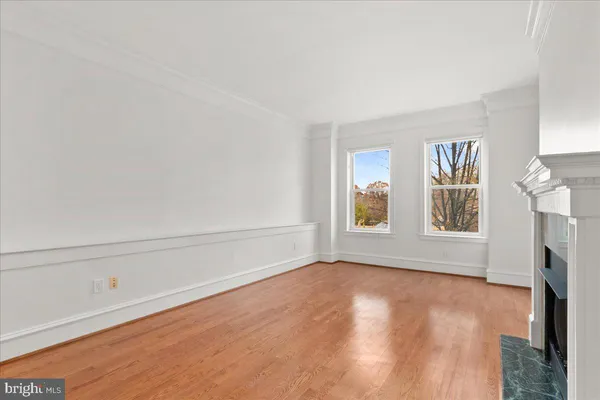 a view of an empty room with a window
