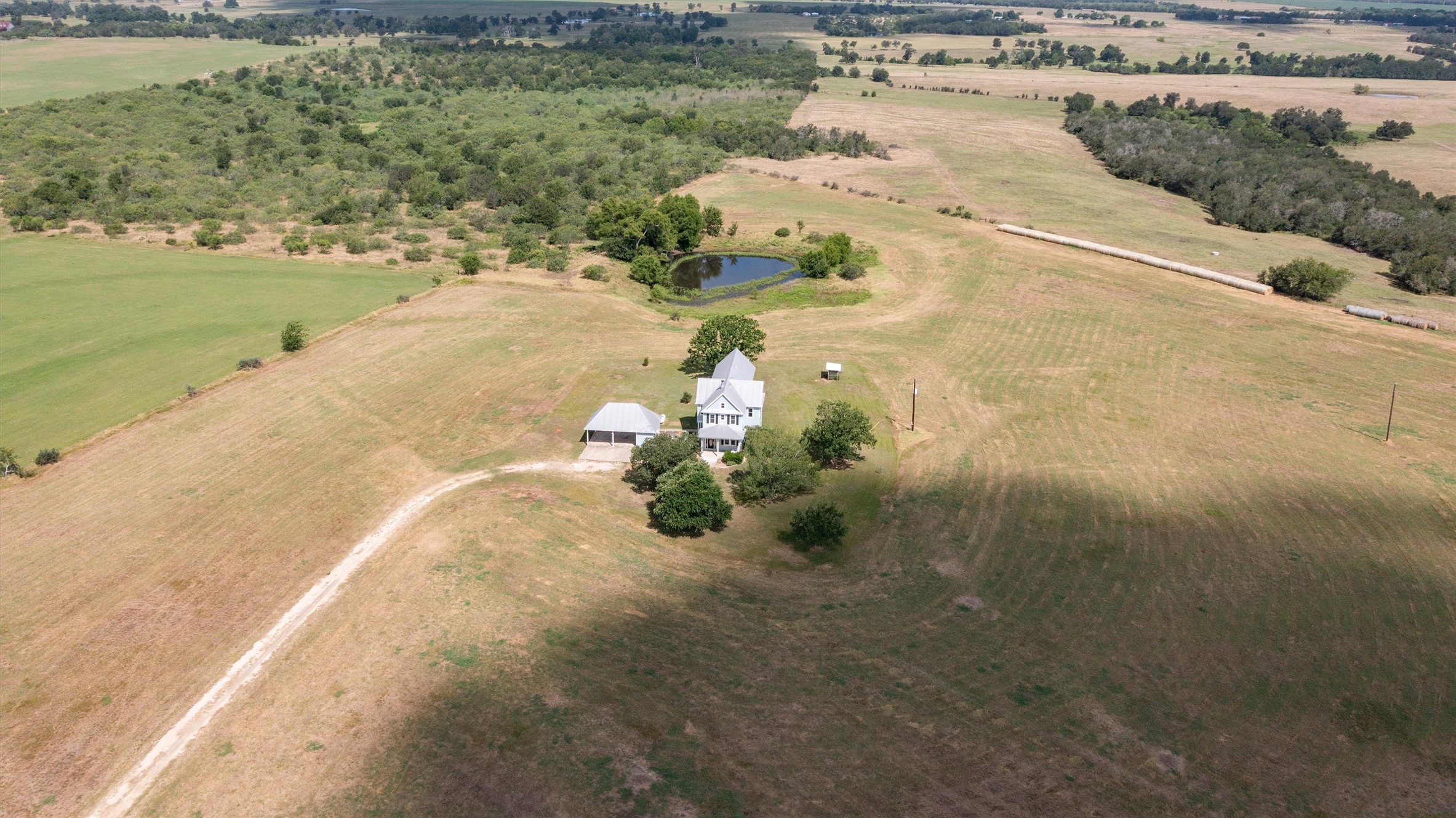 768 Upper Elgin River Road Elgin, TX 78621 - Photo 31 of 40 Aerial view and pond is on the property