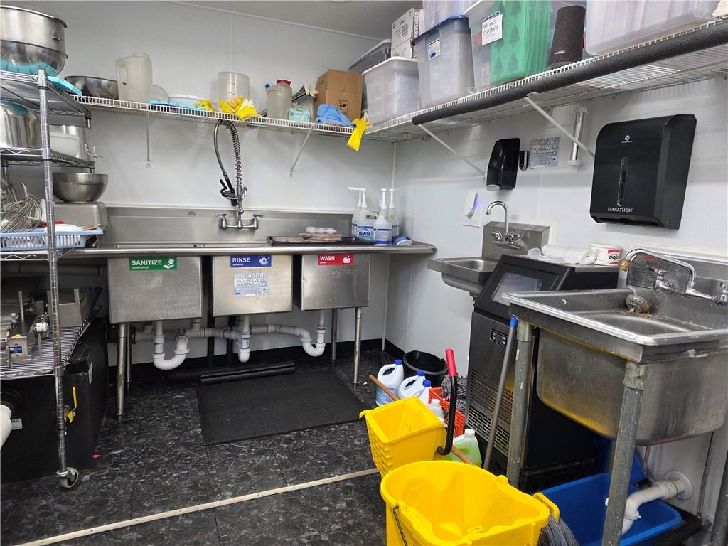 122 South 2nd Avenue Elizabeth, PA 15037 - Photo 20 of 23 a kitchen with a sink a stove and cabinets