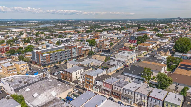 an aerial view of a city with lots of residential buildings