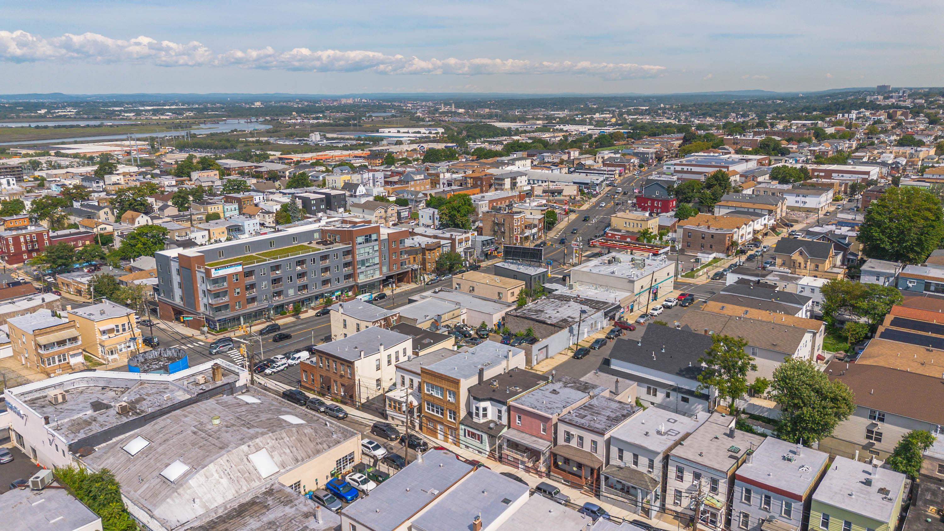 600 67th Street, Unit 2 West New York, NJ 07093 - Photo 1 of 13 an aerial view of a city with lots of residential buildings