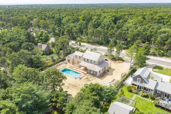 an aerial view of residential house with outdoor space