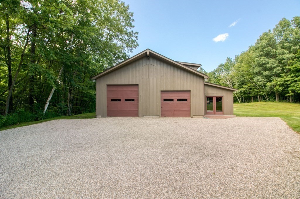 65 White Loaf Road Southampton, MA 01073 - Photo 2 of 33 a view of a house with a yard and large tree