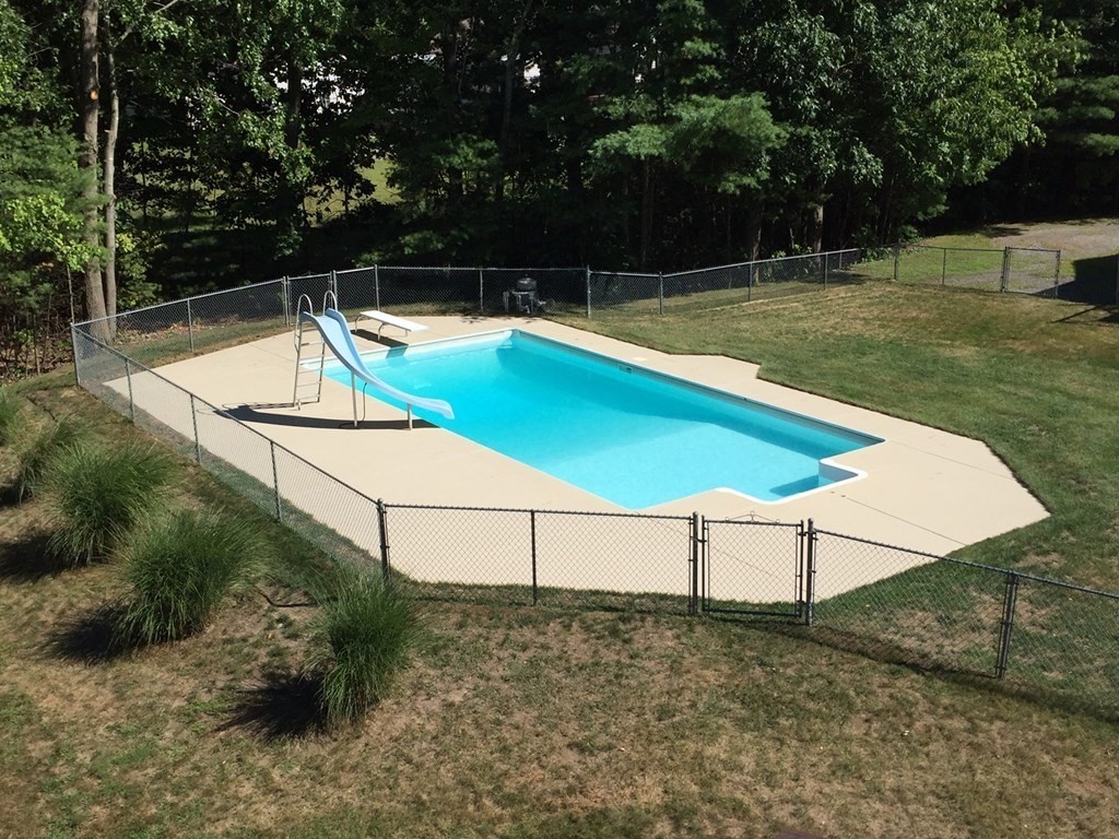 65 White Loaf Road Southampton, MA 01073 - Photo 3 of 33 a view of a tennis ground with large trees